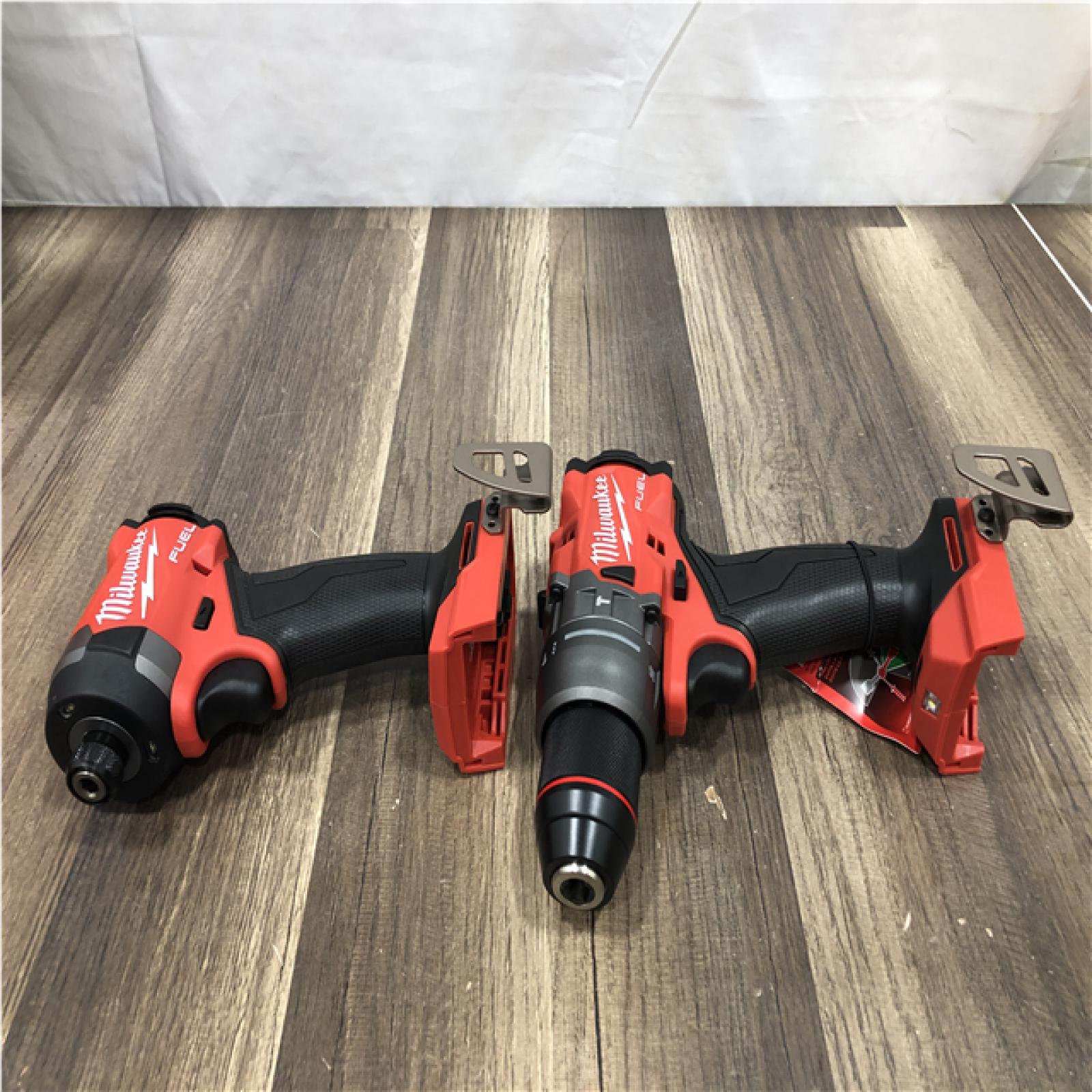 AS-IS Milwaukee FUEL 18V Lithium-Ion Brushless Cordless Hammer Drill and Impact Driver Combo Kit