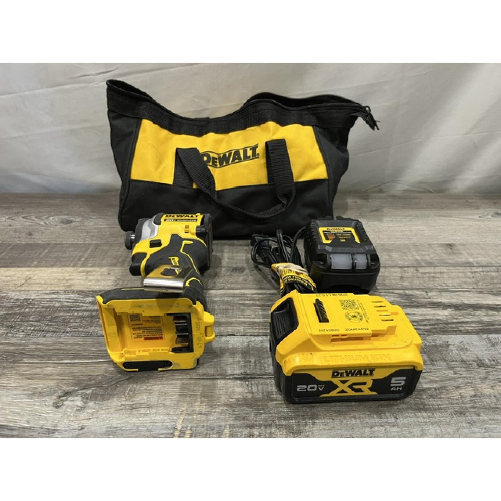 AS-IS DEWALT ATOMIC 20V MAX Lithium-Ion Cordless 1/4 in. Brushless Impact Driver Kit