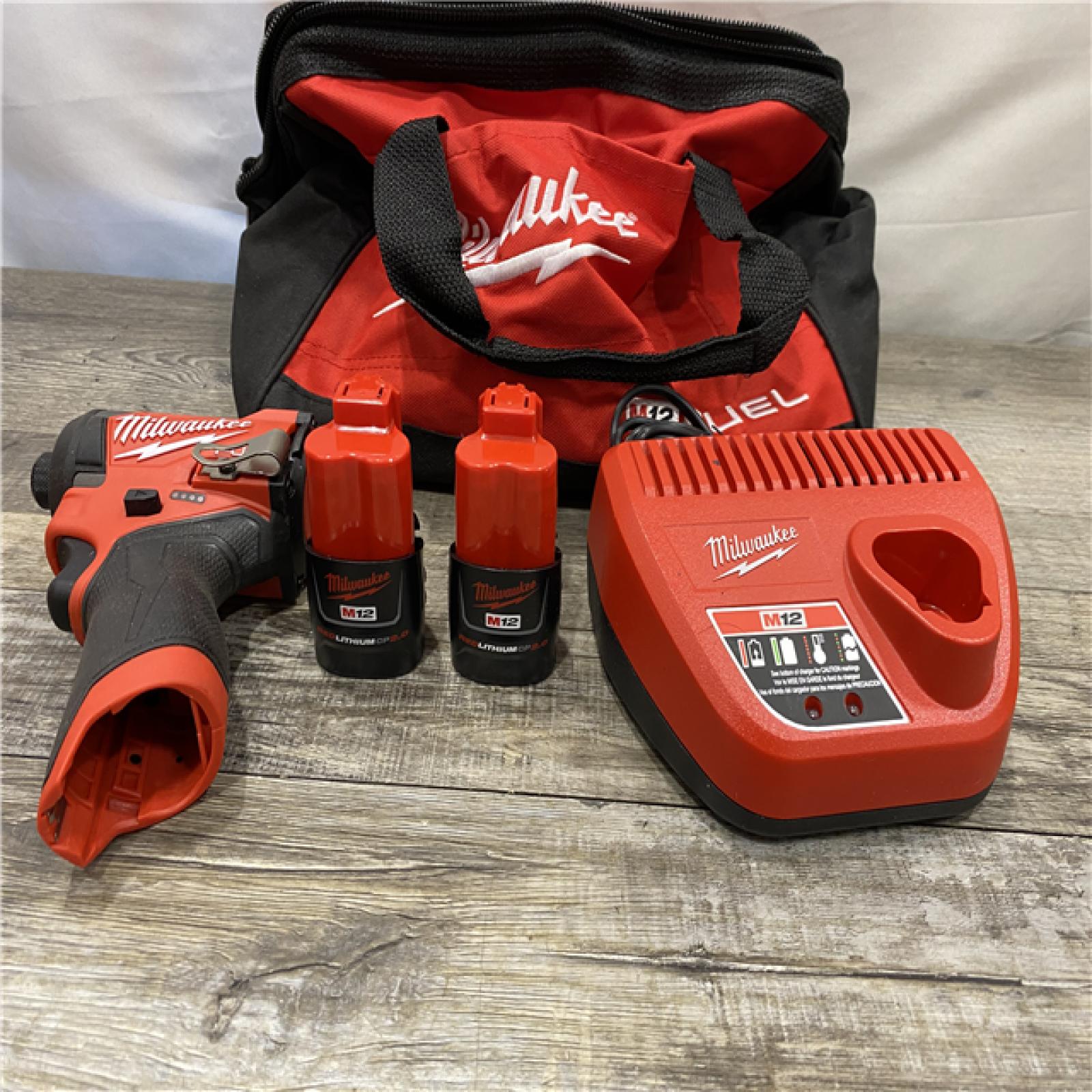 AS-IS Milwaukee  FUEL 12V Lithium-Ion Brushless Cordless 1/4 in. Hex Impact Driver Kit