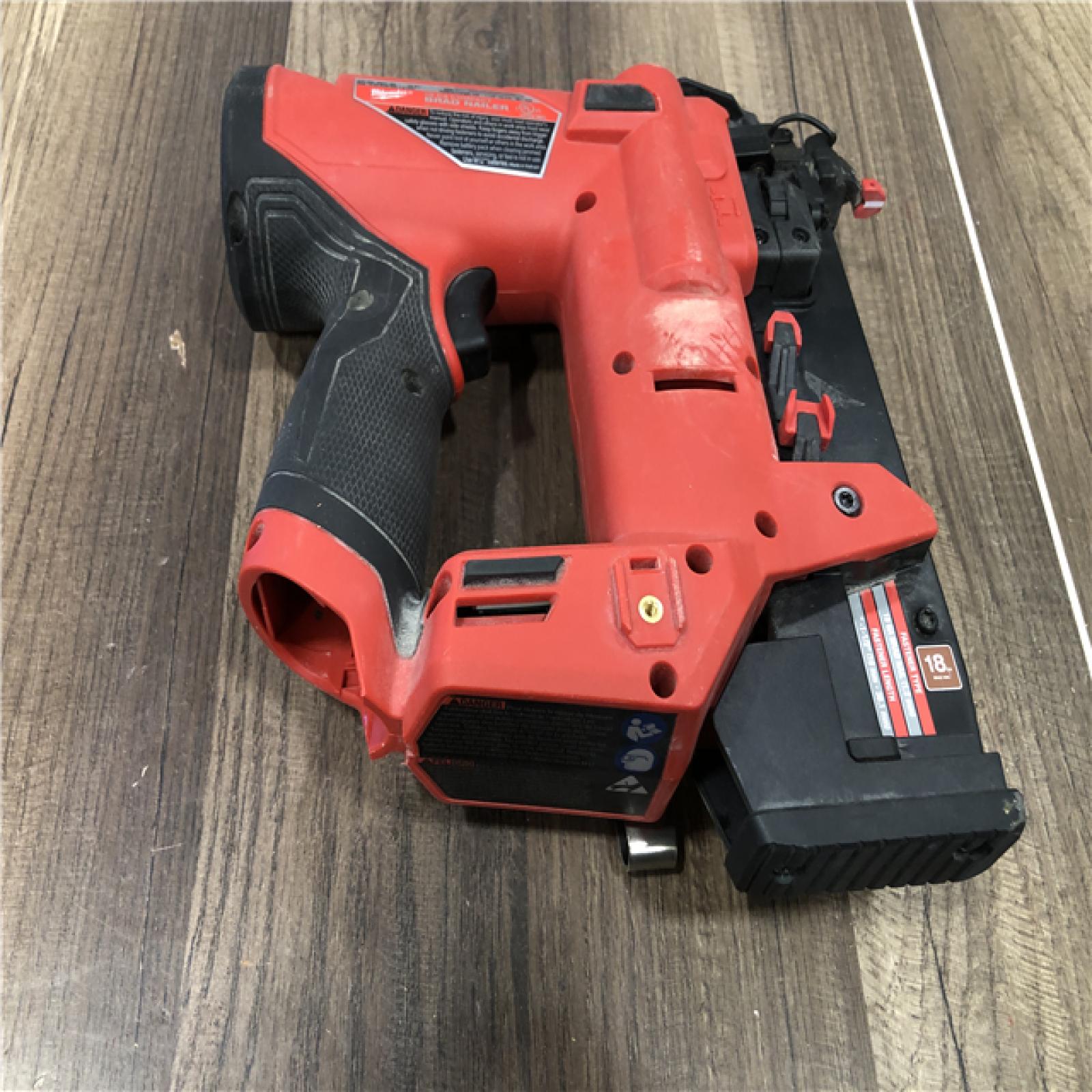 AS-IS Milwaukee FUEL 12-Volt Lithium-Ion Brushless Cordless 18-Gauge 1-1/2 in. Compact Brad Nailer (Tool Only)