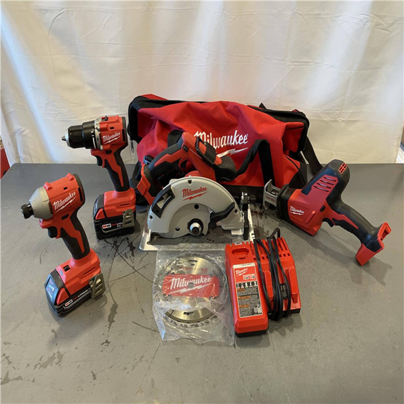 AS-IS - Milwaukee M18 18-Volt Lithium-Ion Brushless Cordless Combo Kit (4-Tool)