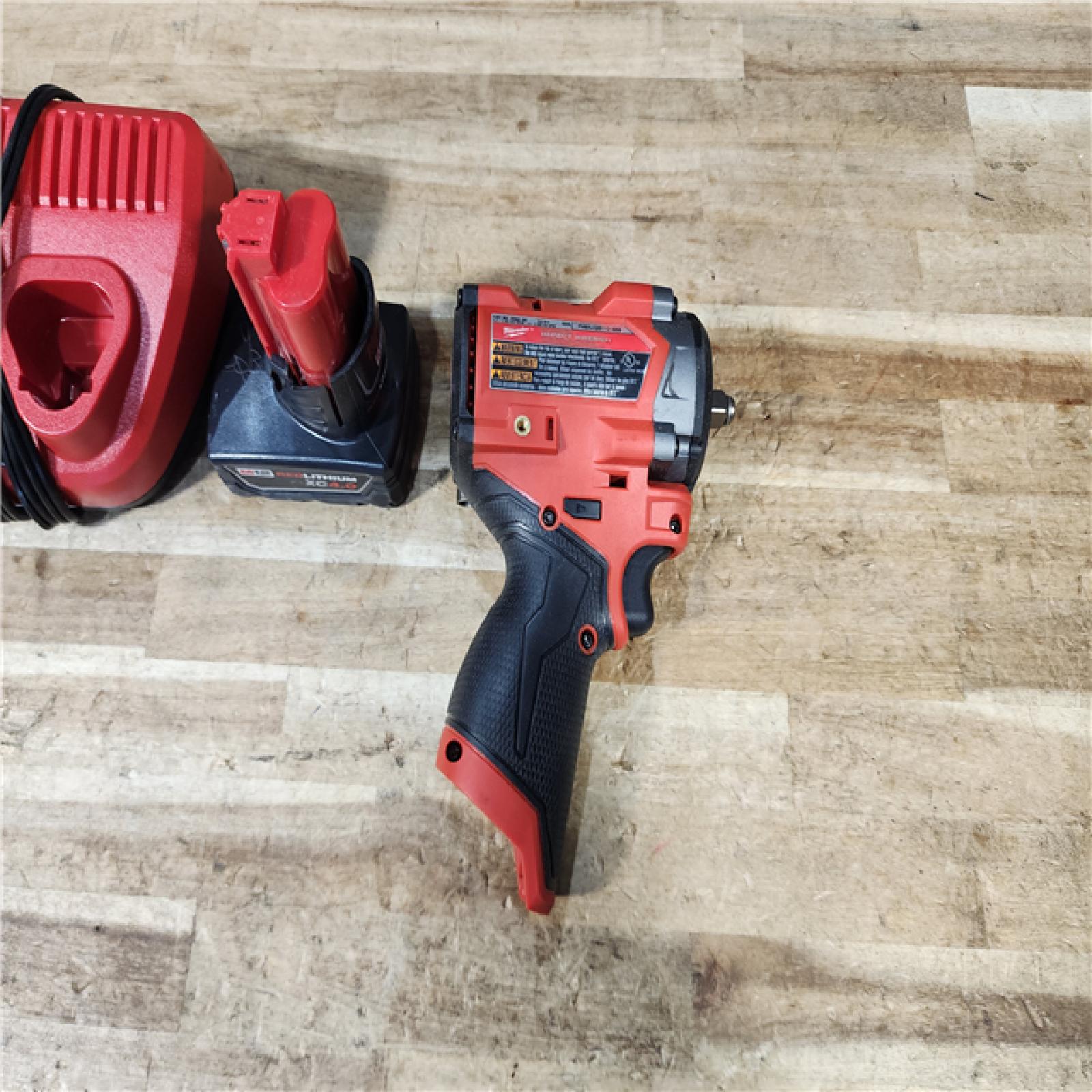 HOUSTON LOCATION - AS - IS Milwaukee FUEL 12V Li-Ion Brushless Cordless Stubby 3/8 in. Impact Wrench Kit