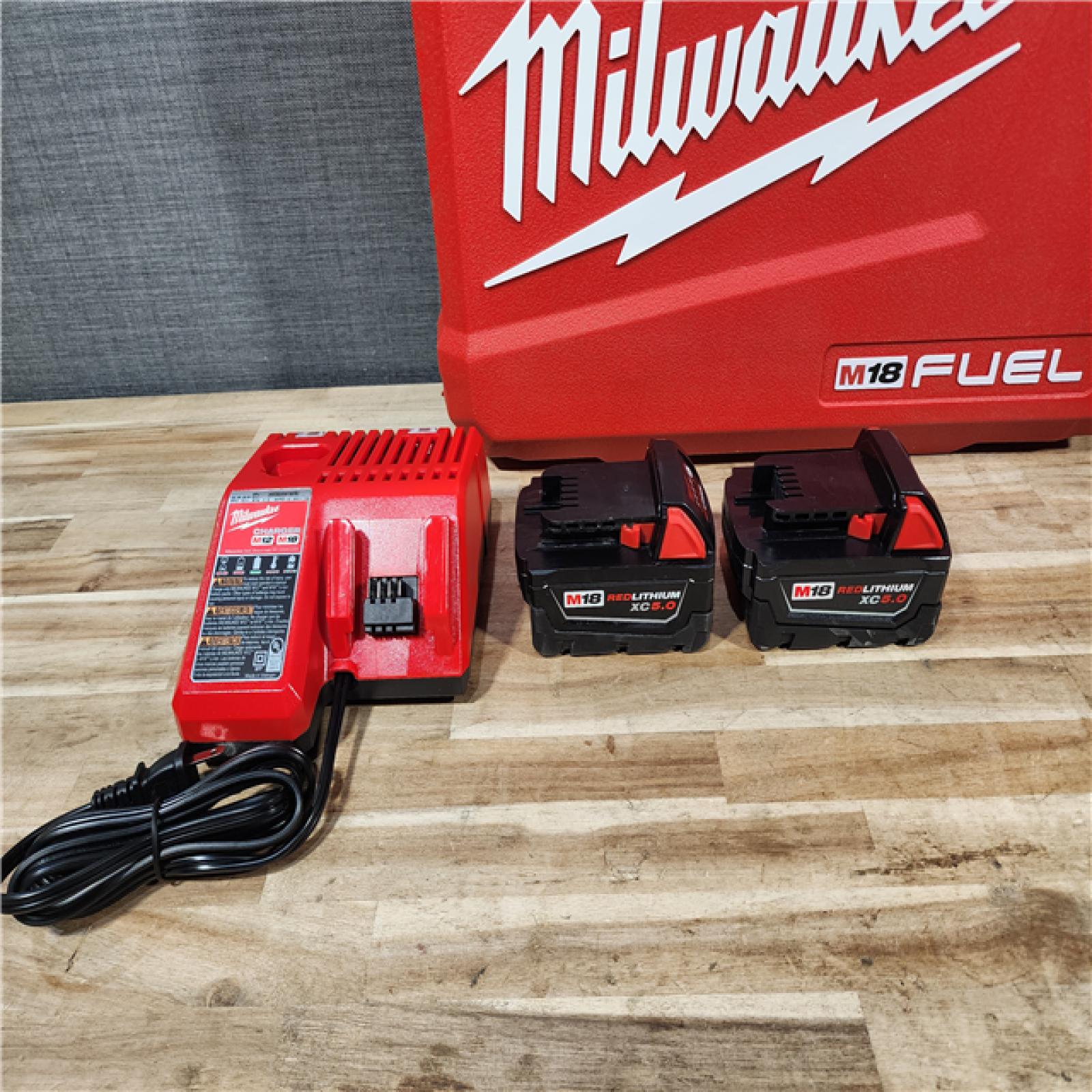 HOUSTON LOCATION - AS-IS Milwaukee FUEL 18V Lithium-Ion Brushless Cordless Hammer Drill and Impact Driver Combo Kit