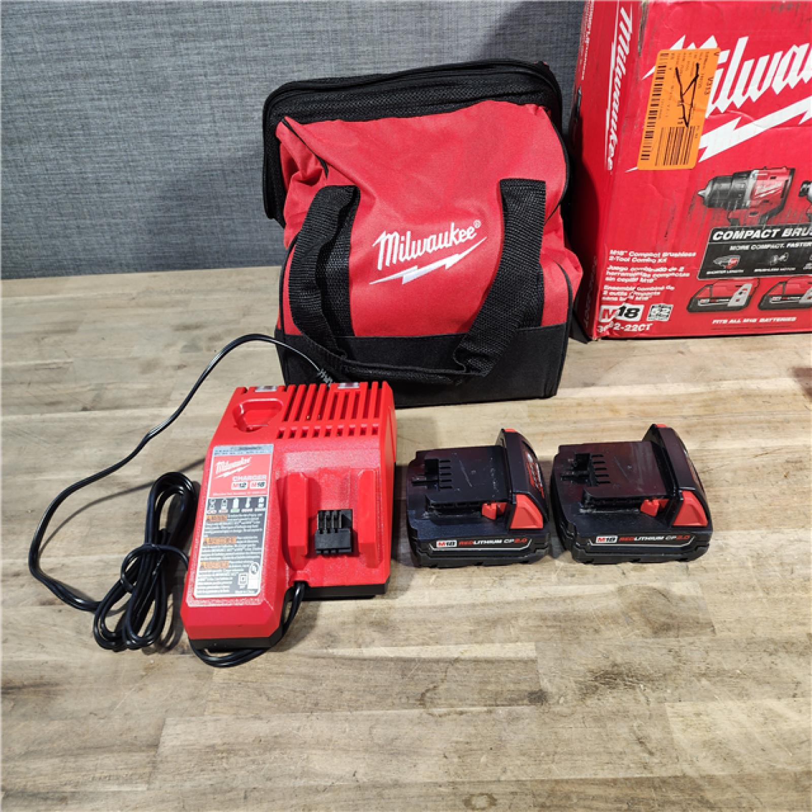 HOUSTON LOCATION - AS-IS Milwaukee M18 18V Lithium-Ion Brushless Cordless Compact Drill/Impact Combo Kit (2-Tool) W/ (2) 2.0 Ah Batteries, Charger & Bag