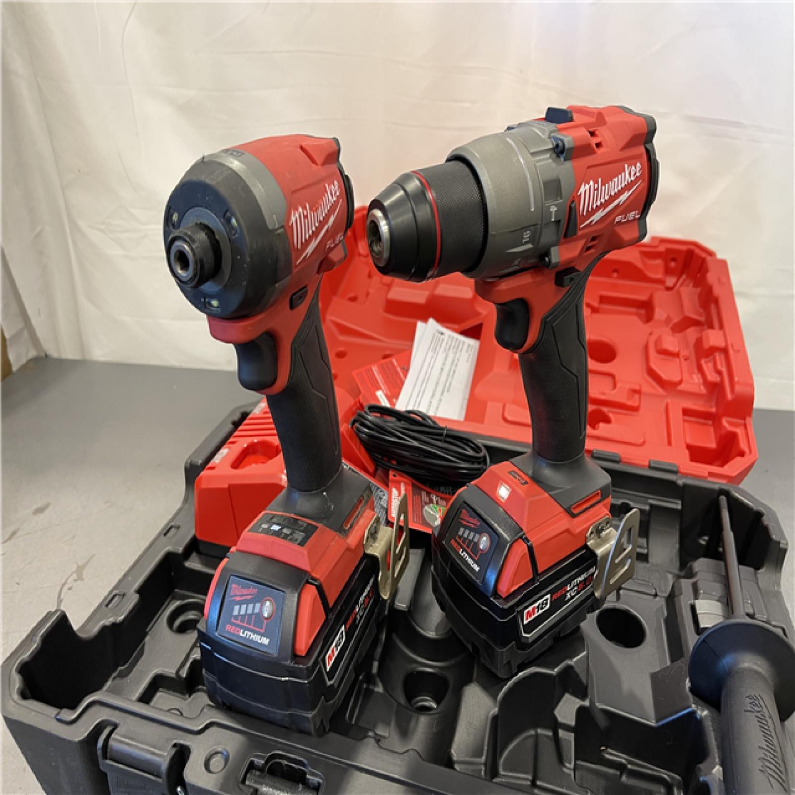 AS-IS - MILWAUKEE FUEL 18V Lithium-Ion Brushless Cordless Hammer Drill and Impact Driver Combo Kit