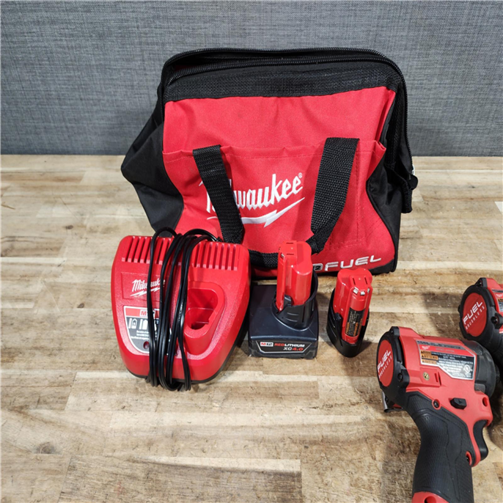 HOUSTON LOCATION - AS - IS Milwaukee 2 Tool Combo Kit W/ (2) Battery & Charger