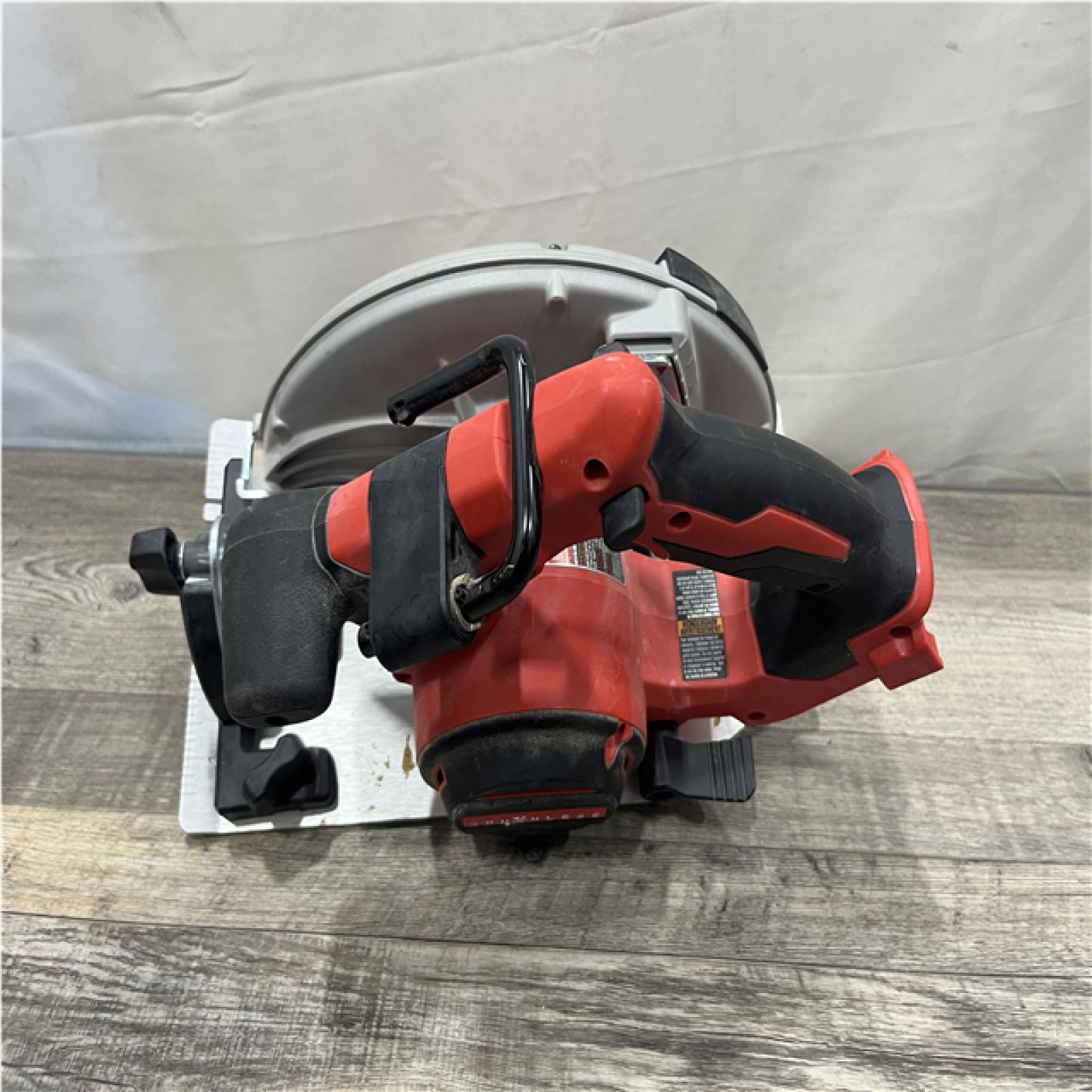 AS-IS Milwaukee 18V Lithium-Ion Brushless Cordless 7-1/4 in. Circular Saw (Tool-Only)
