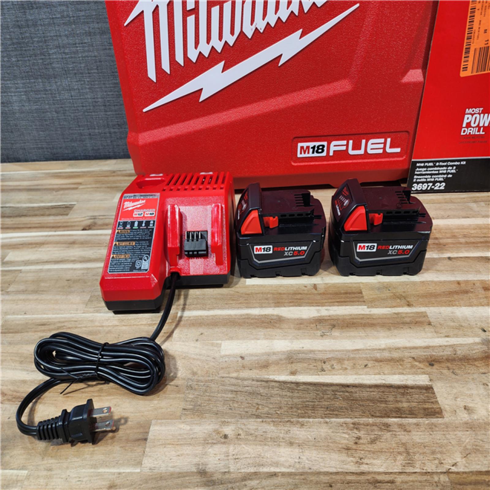 HOUSTON LOCATION - AS-IS Milwaukee  FUEL 18V Lithium-Ion Brushless Cordless Hammer Drill and Impact Driver Combo Kit