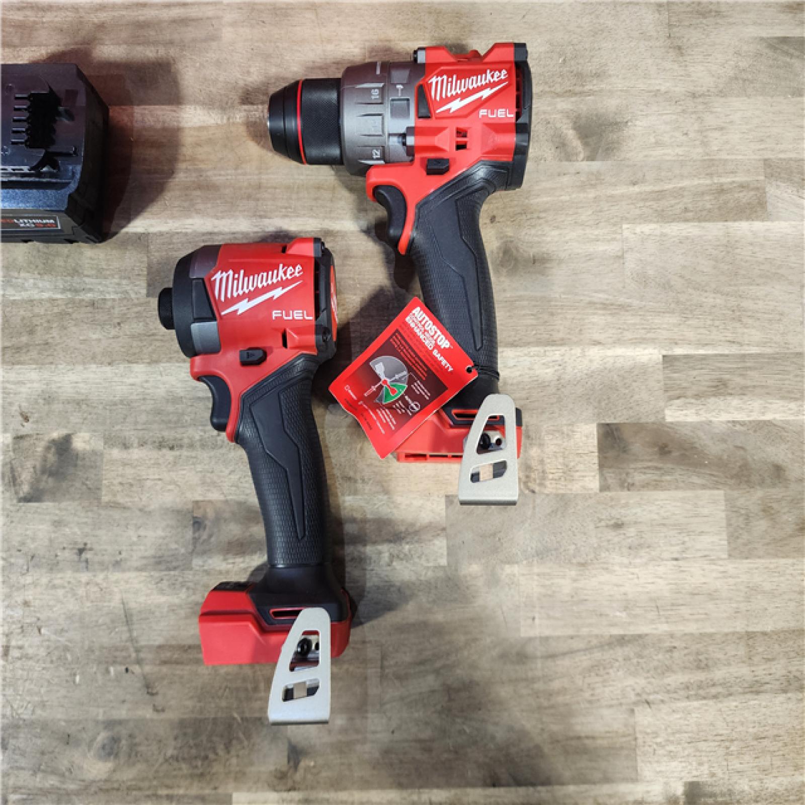 HOUSTON LOCATION - AS-IS (APPEARS LIKE NEW) MILWAUKEE M18 FUEL 18V Lithium-Ion Brushless Cordless Hammer Drill and Impact Driver Combo Kit (2-Tool) with 2 Batteries