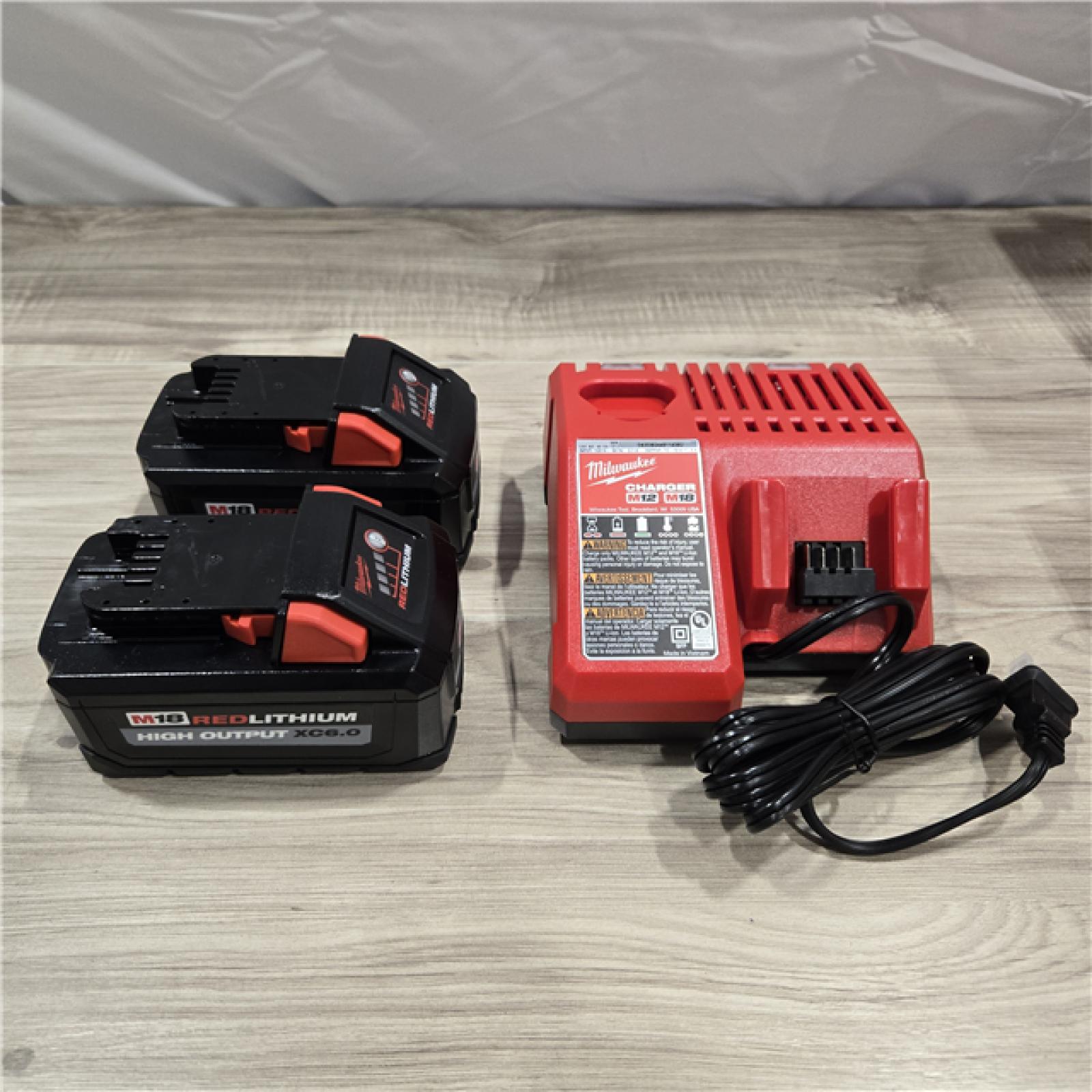 LIKE NEW! - Milwaukee 18-Volt Lithium-Ion High Output Starter Kit with Two 6.0 Ah Battery and Charger