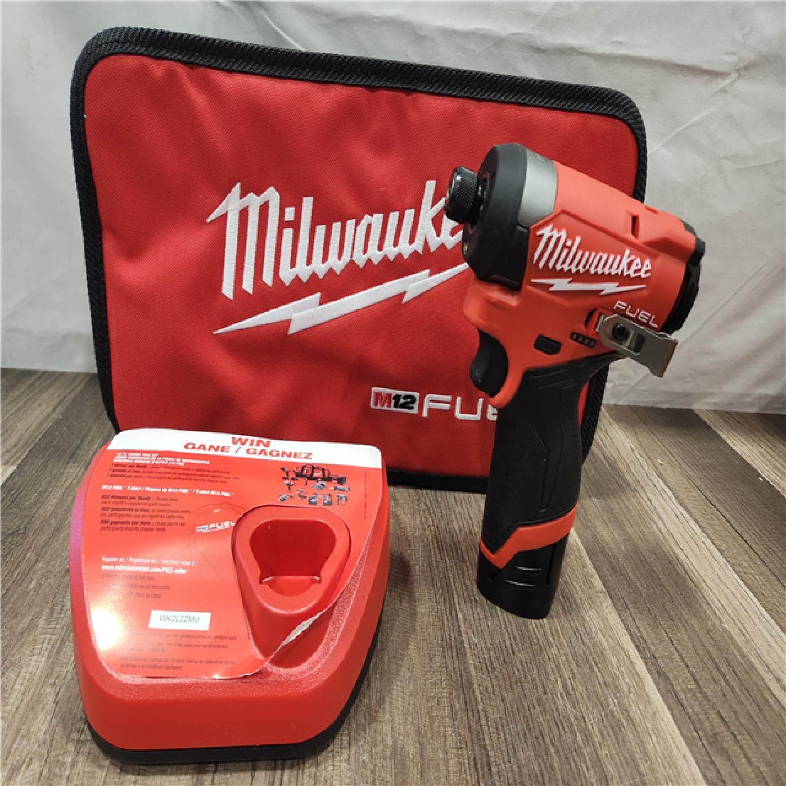 AS-IS- Milwaukee M12 FUEL 12-Volt Lithium-Ion Brushless Cordless 1/4 in. Hex Impact Driver Compact Kit