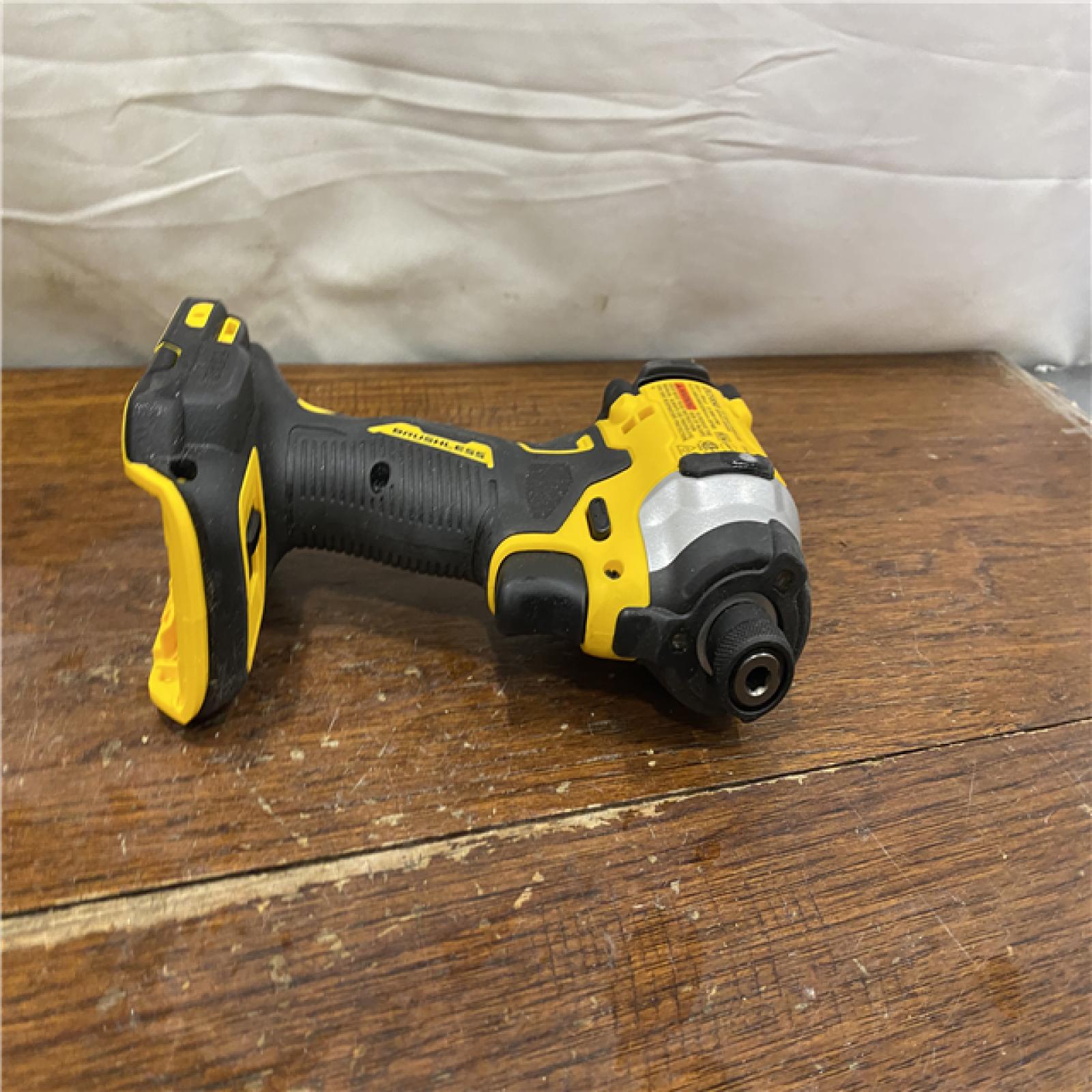 AS-IS DEWALT ATOMIC 20V MAX Lithium-Ion Cordless 1/4 in. Brushless Impact Driver Kit, 5 Ah Battery, Charger, and Bag