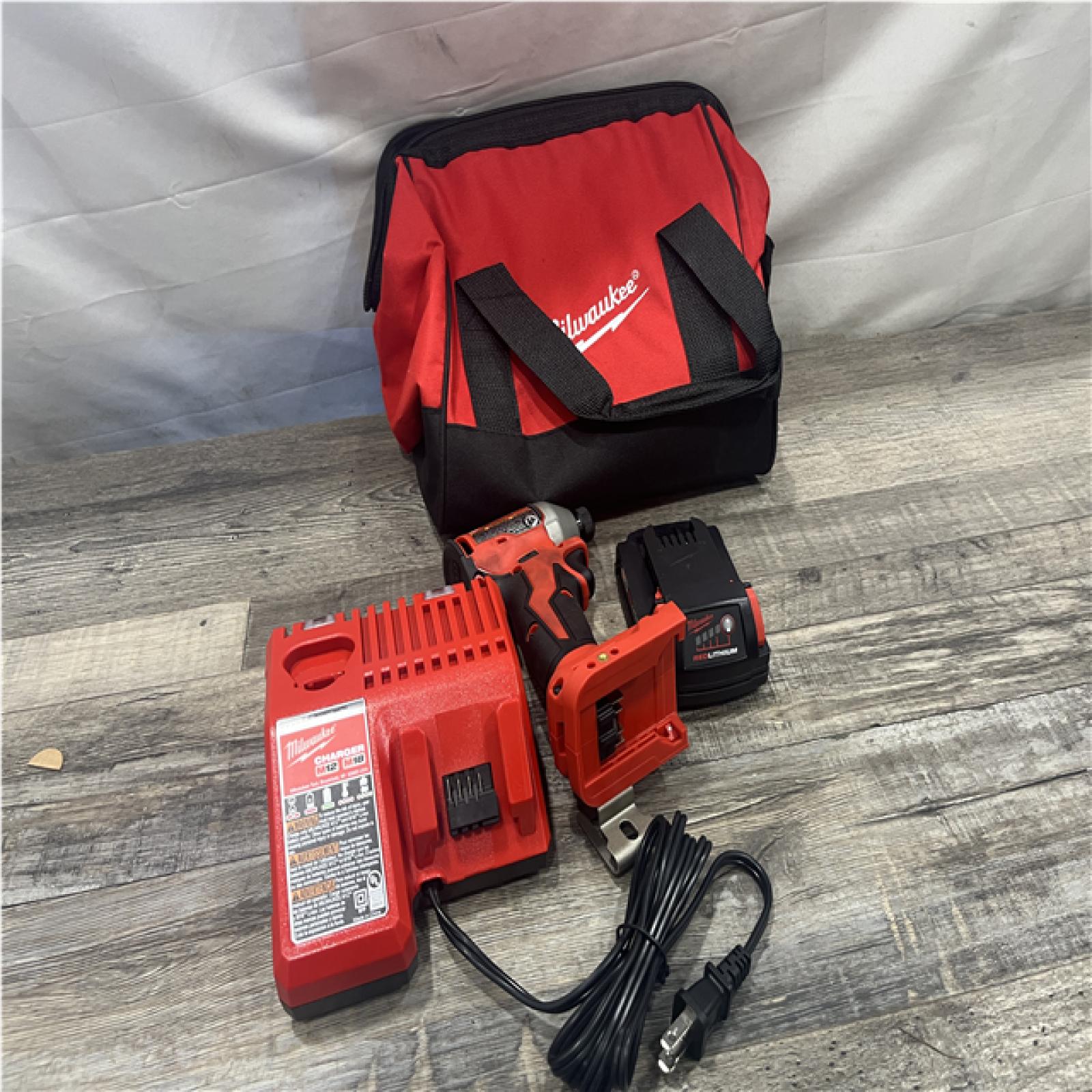AS-IS Milwaukee 18-Volt Lithium-Ion Compact Brushless Cordless 1/4 in. Impact Driver Kit