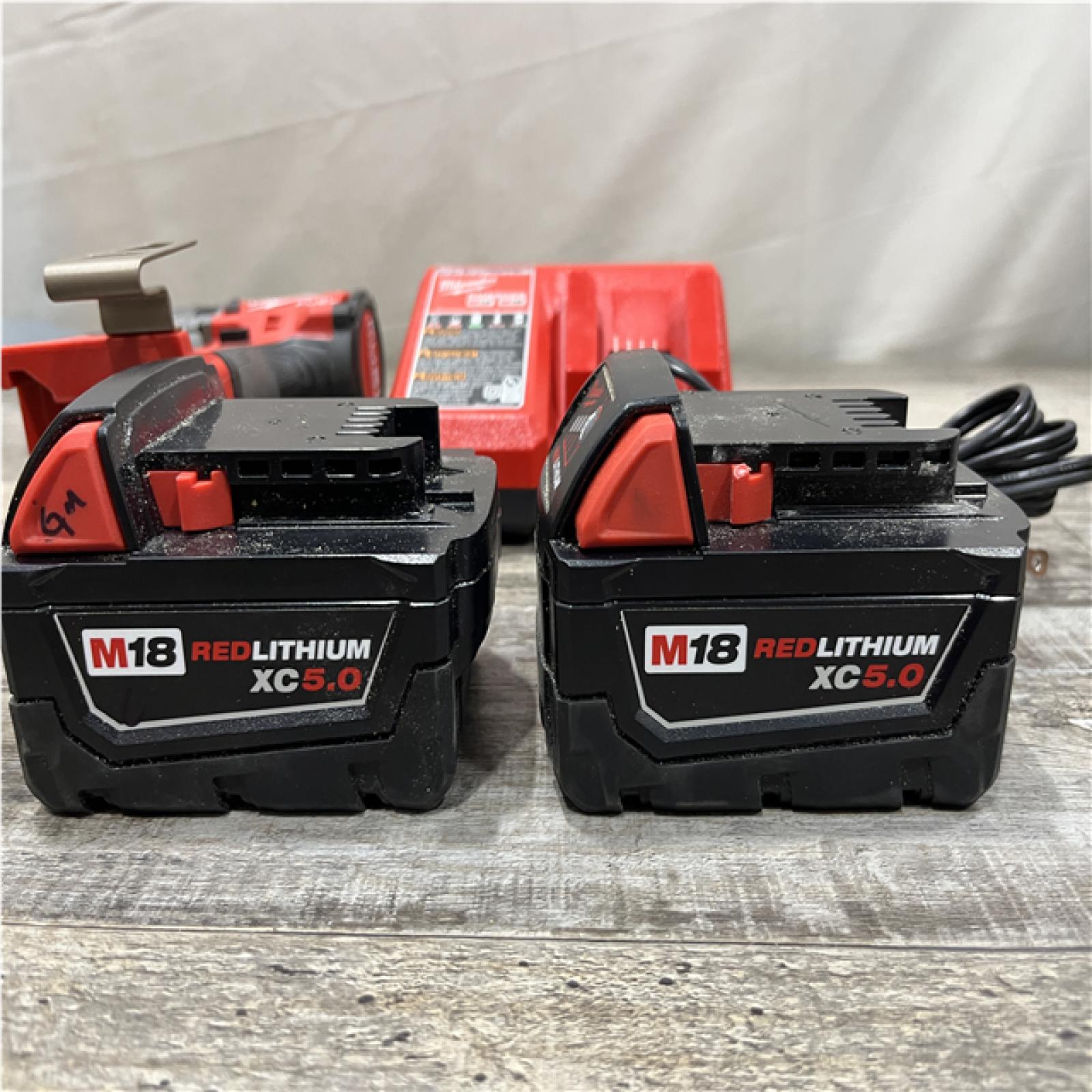 AS-IS Milwaukee FUEL 18V Lithium-Ion Brushless Cordless 1/2 in. Hammer Drill Driver Kit