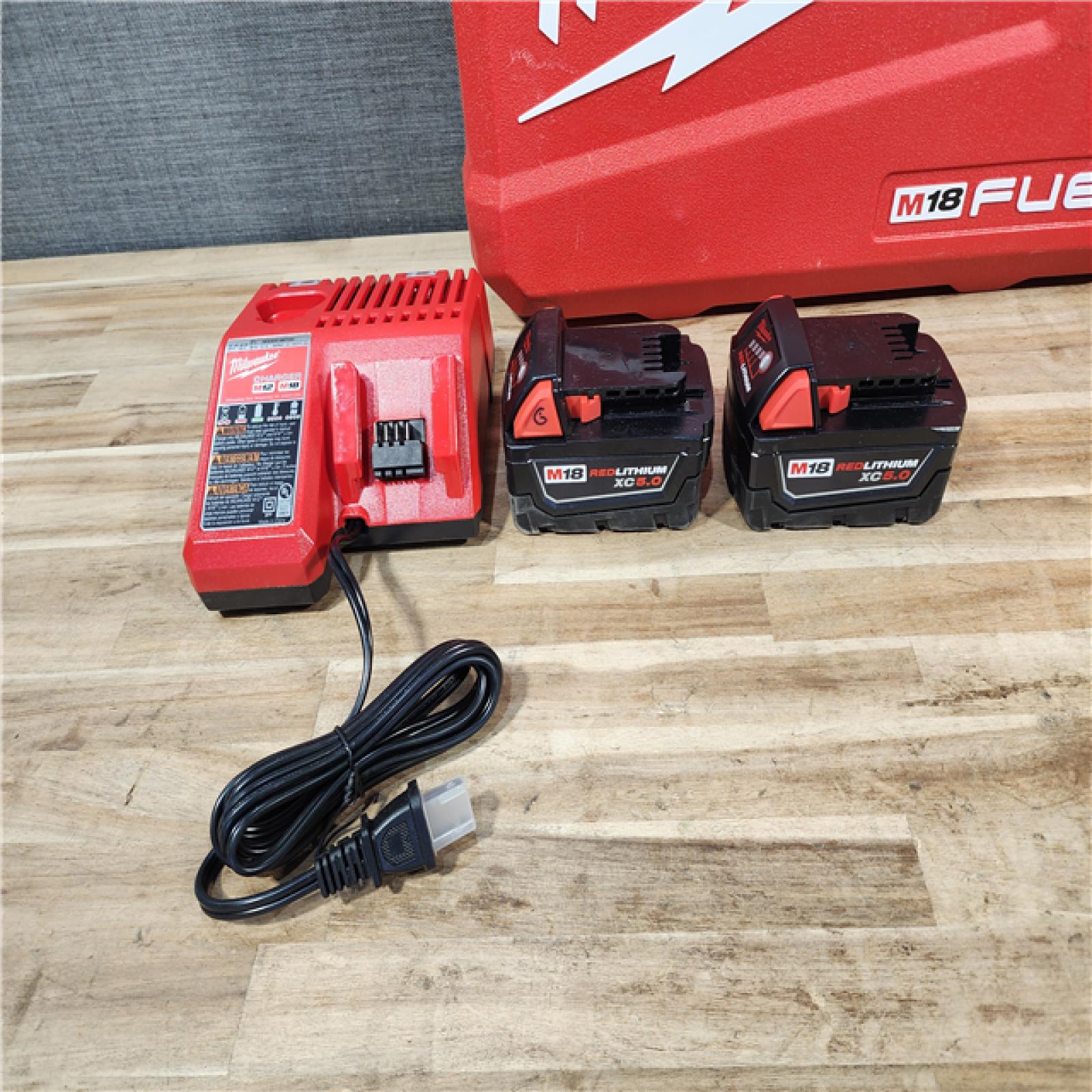 HOUSTON LOCATION - AS-IS Milwaukee FUEL 18V Lithium-Ion Brushless Cordless Hammer Drill and Impact Driver Combo Kit