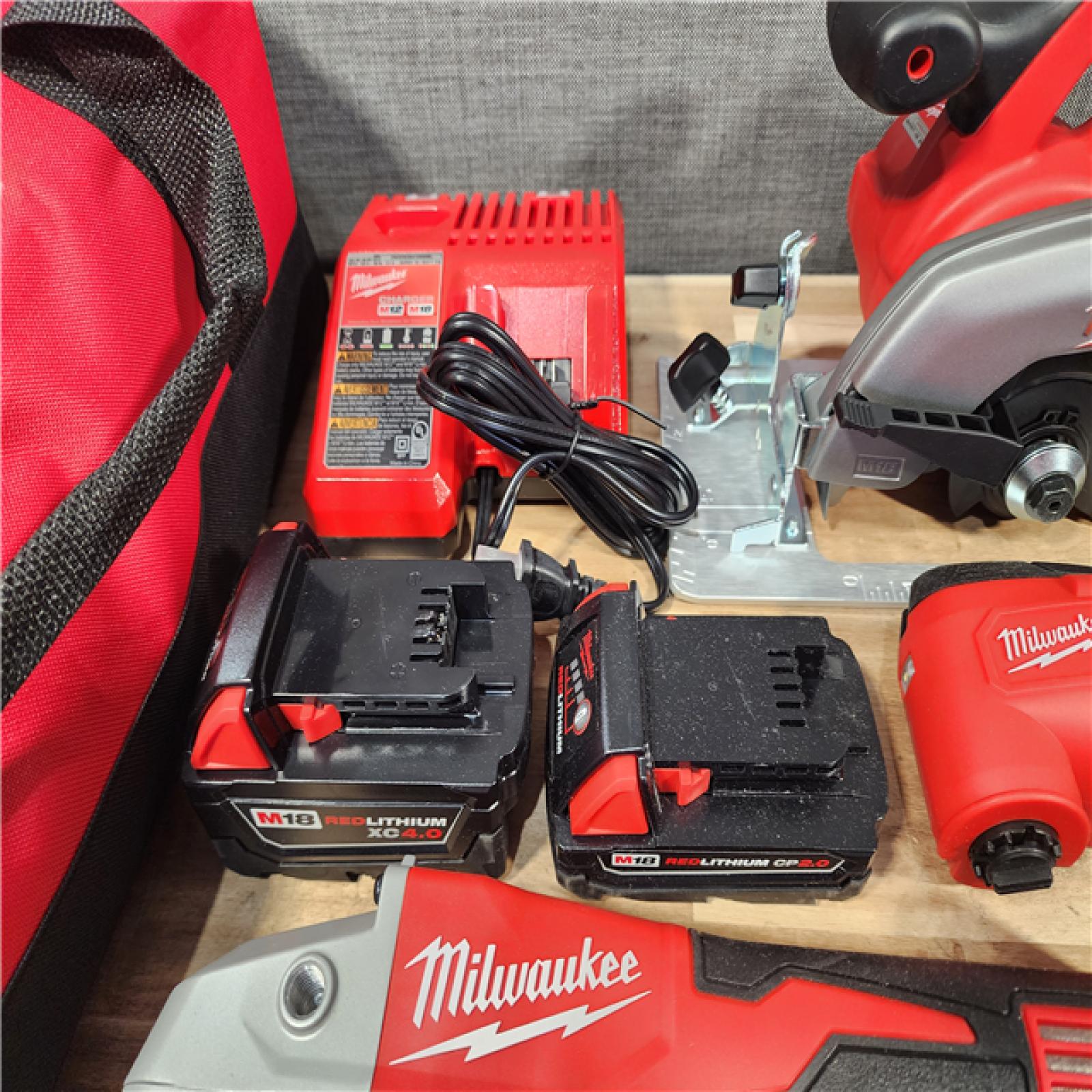 HOUSTON LOCATION - AS-IS (APPEARS LIKE NEW) M18 18-Volt Lithium-Ion Cordless Combo Kit 9-Tool with 2-Batteries  Charger and Tool Bag