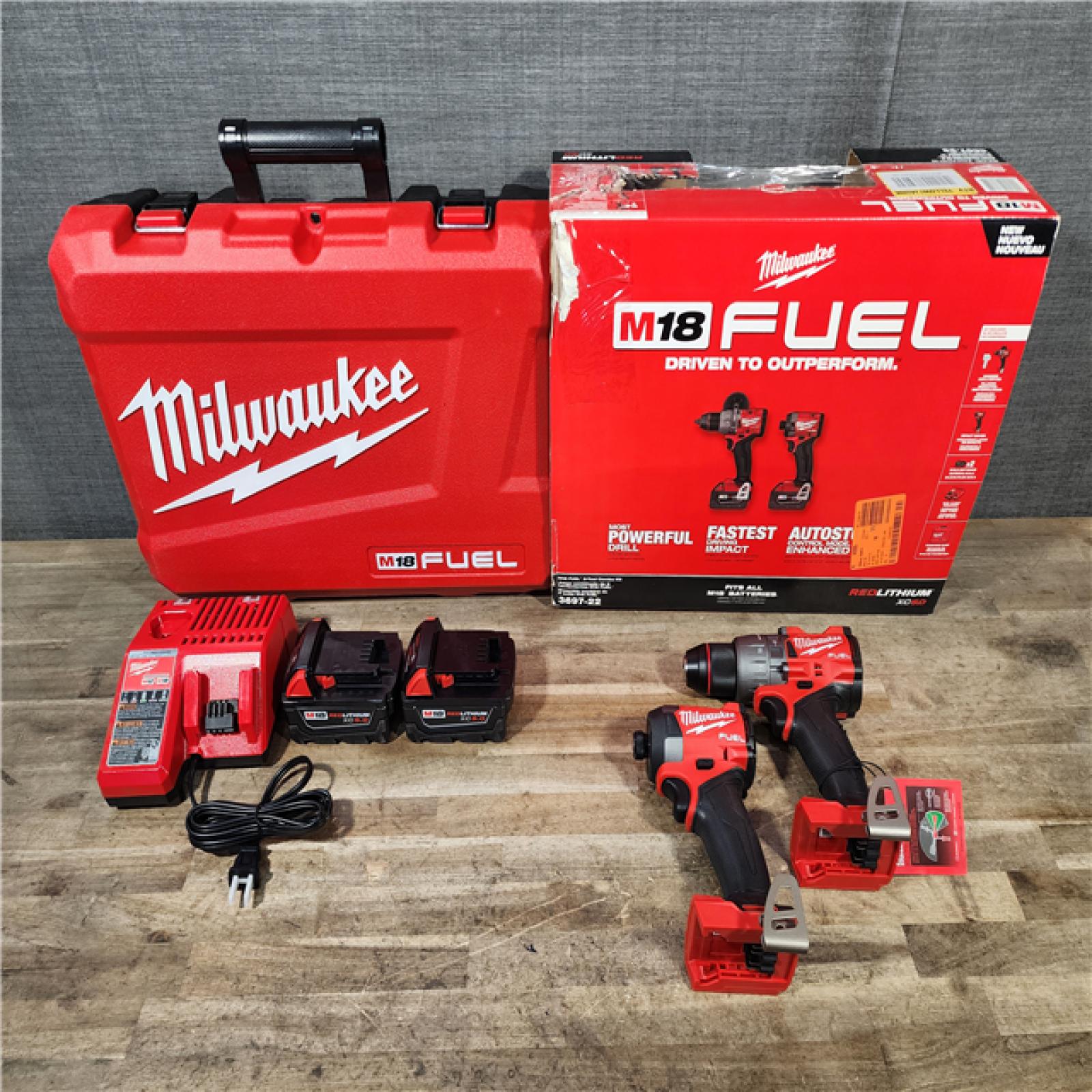 HOUSTON LOCATION - AS-IS (APPEARS LIKE NEW) Milwaukee 18V Lithium-Ion Brushless Cordless Hammer Drill and Impact Driver Combo Kit