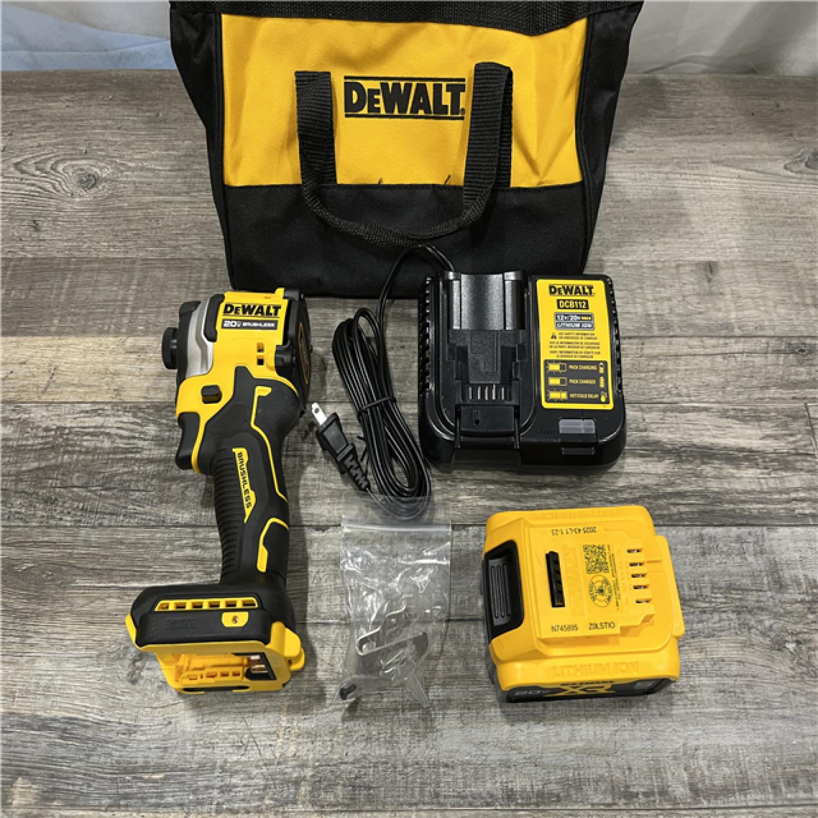AS-IS DEWALT ATOMIC 20V MAX Lithium-Ion Cordless 1/4 in. Brushless Impact Driver Kit