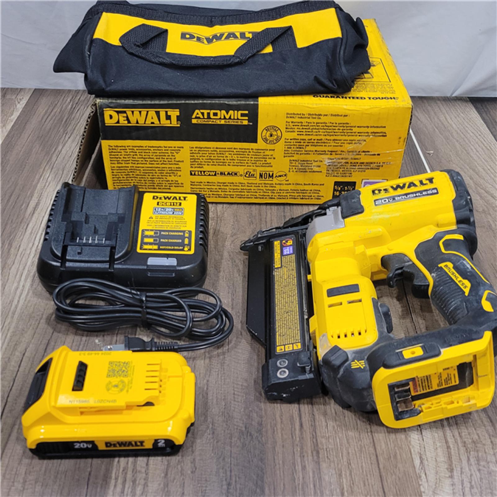 AS-IS DEWALT ATOMIC 20V MAX Lithium Ion Cordless 23 Gauge Pin Nailer Kit with 3.0Ah Battery and Charger