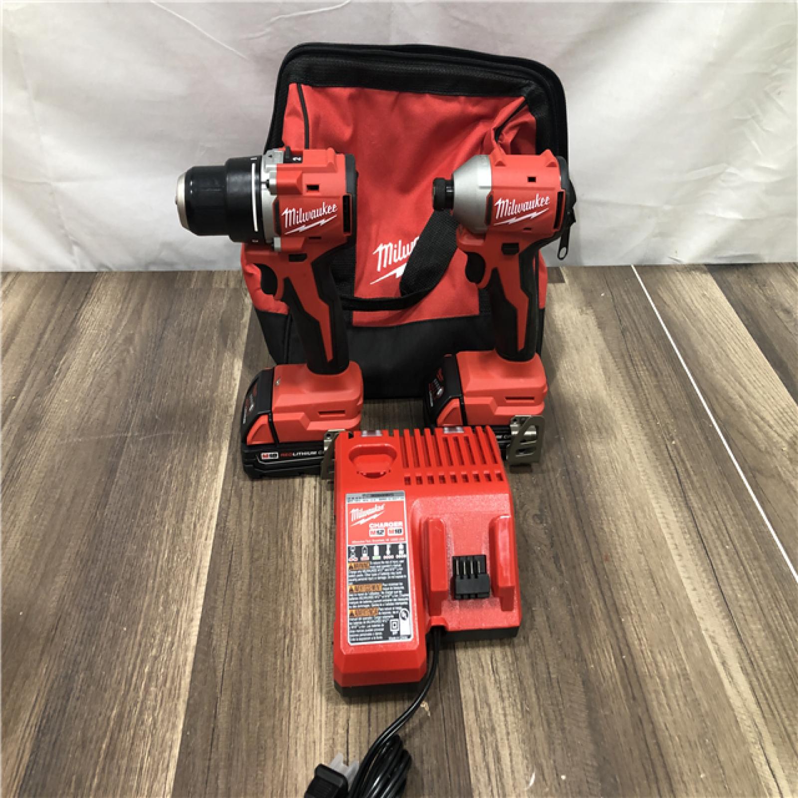 AS-IS  Milwaukee 18V Lithium-Ion Brushless Cordless Compact Drill/Impact Combo Kit