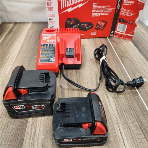 AS-IS Milwaukee M18 18-Volt Lithium-Ion Starter Kit with One 5.0 Ah and One 2.0 Ah Battery and Charger