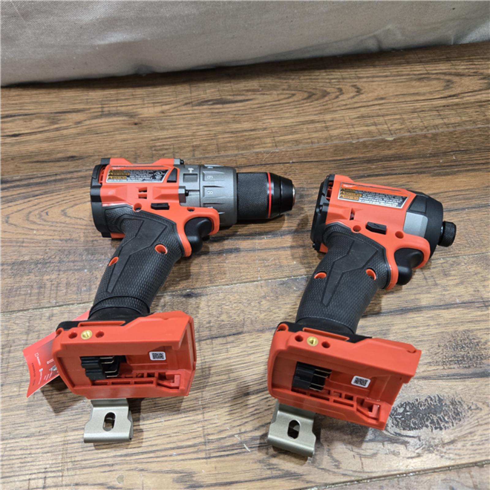 AS-IS MILWAUKEE FUEL 18V Lithium-Ion Brushless Cordless Hammer Drill and Impact Driver Combo Kit (2-Tool) with 2 Batteries