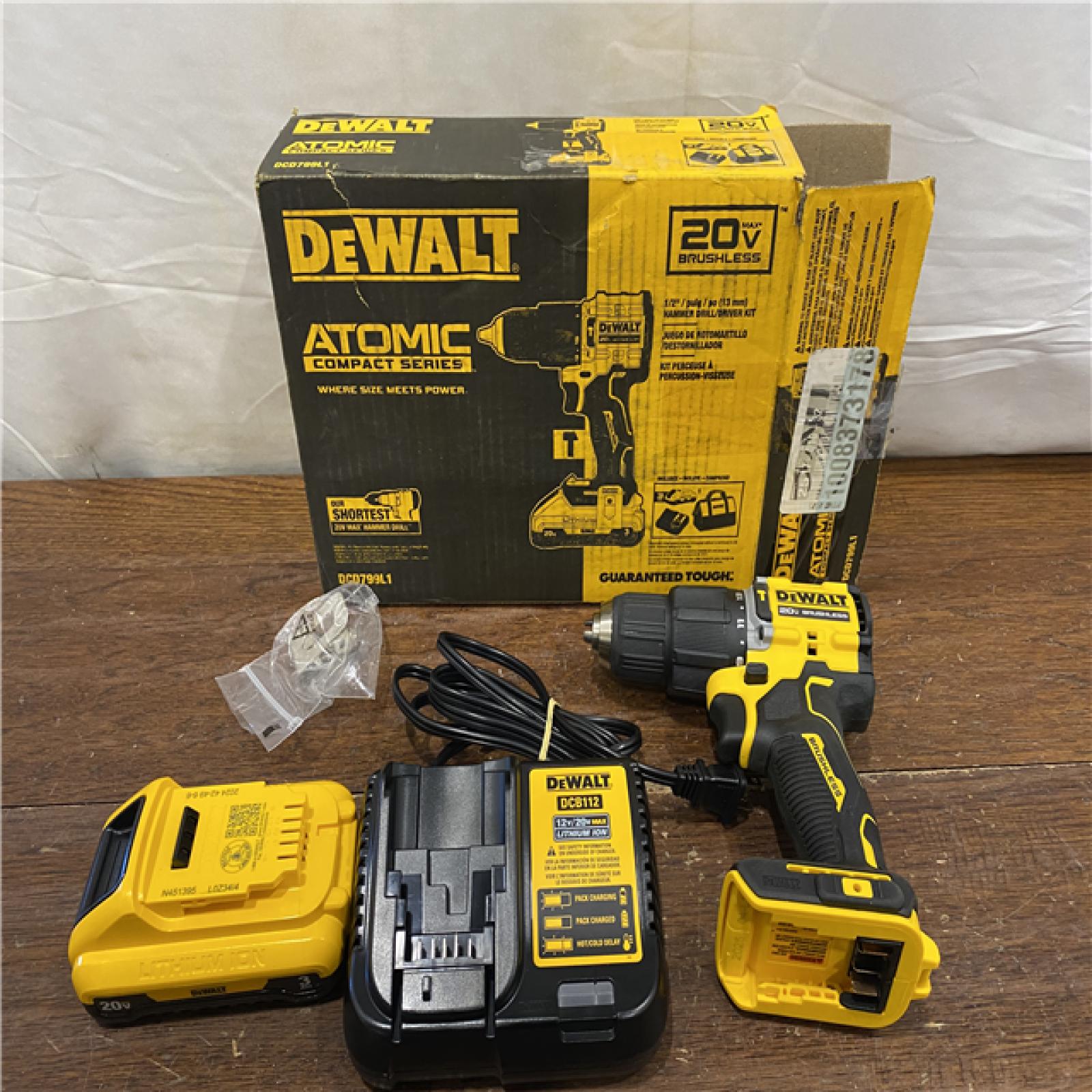 AS-IS DEWALT ATOMIC 20-Volt Lithium-Ion Cordless 1/2 in. Compact Hammer Drill with 3.0Ah Battery, Charger and Bag