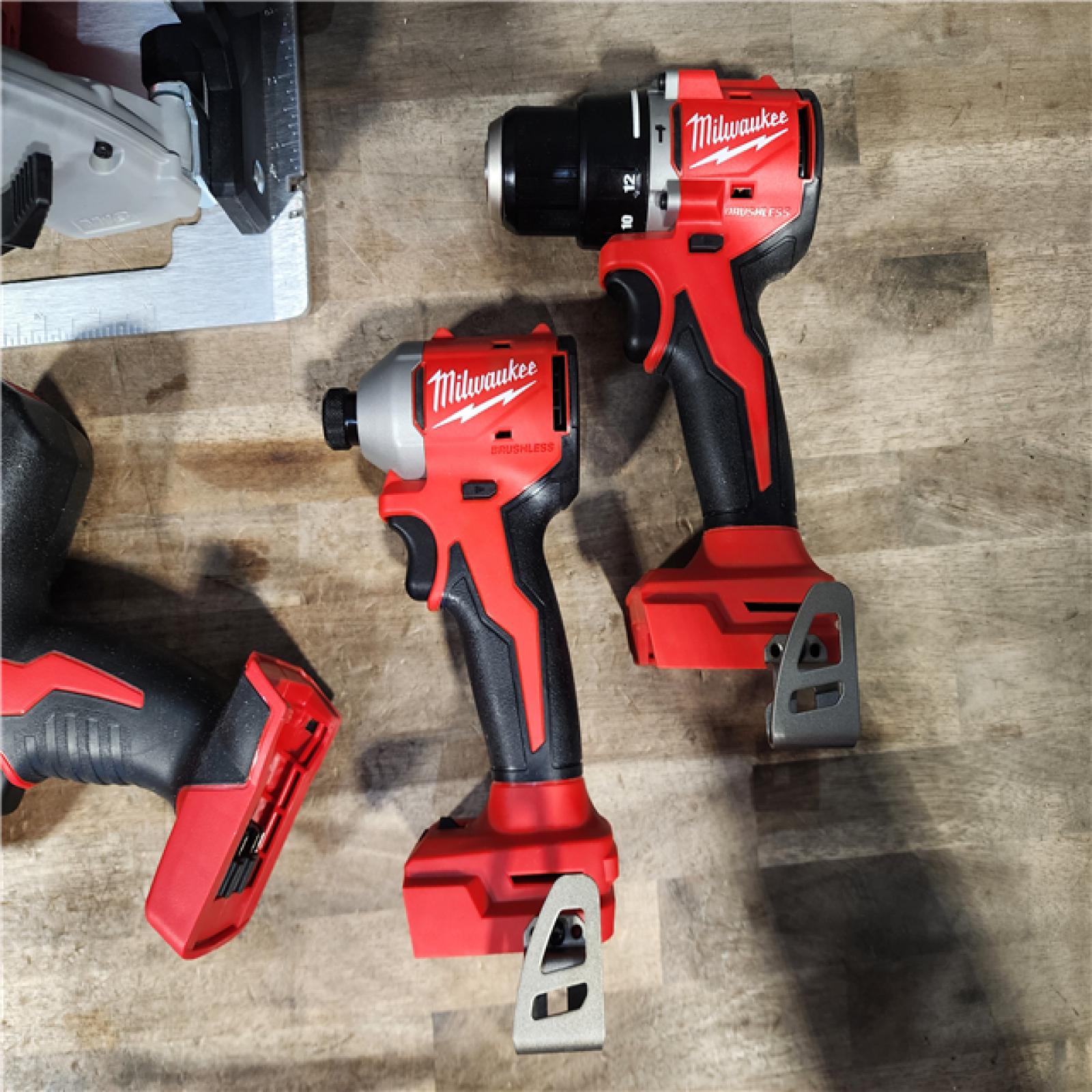 HOUSTON LOCATION - AS-IS Milwaukee M18 18-Volt Lithium-Ion Brushless Cordless Combo Kit (4-Tool) with 2-Batteries  1-Charger and Tool Bag