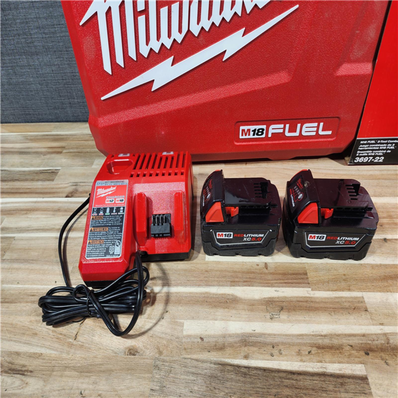 HOUSTON LOCATION - AS-IS Milwaukee FUEL 18V Lithium-Ion Brushless Cordless Hammer Drill and Impact Driver Combo Kit