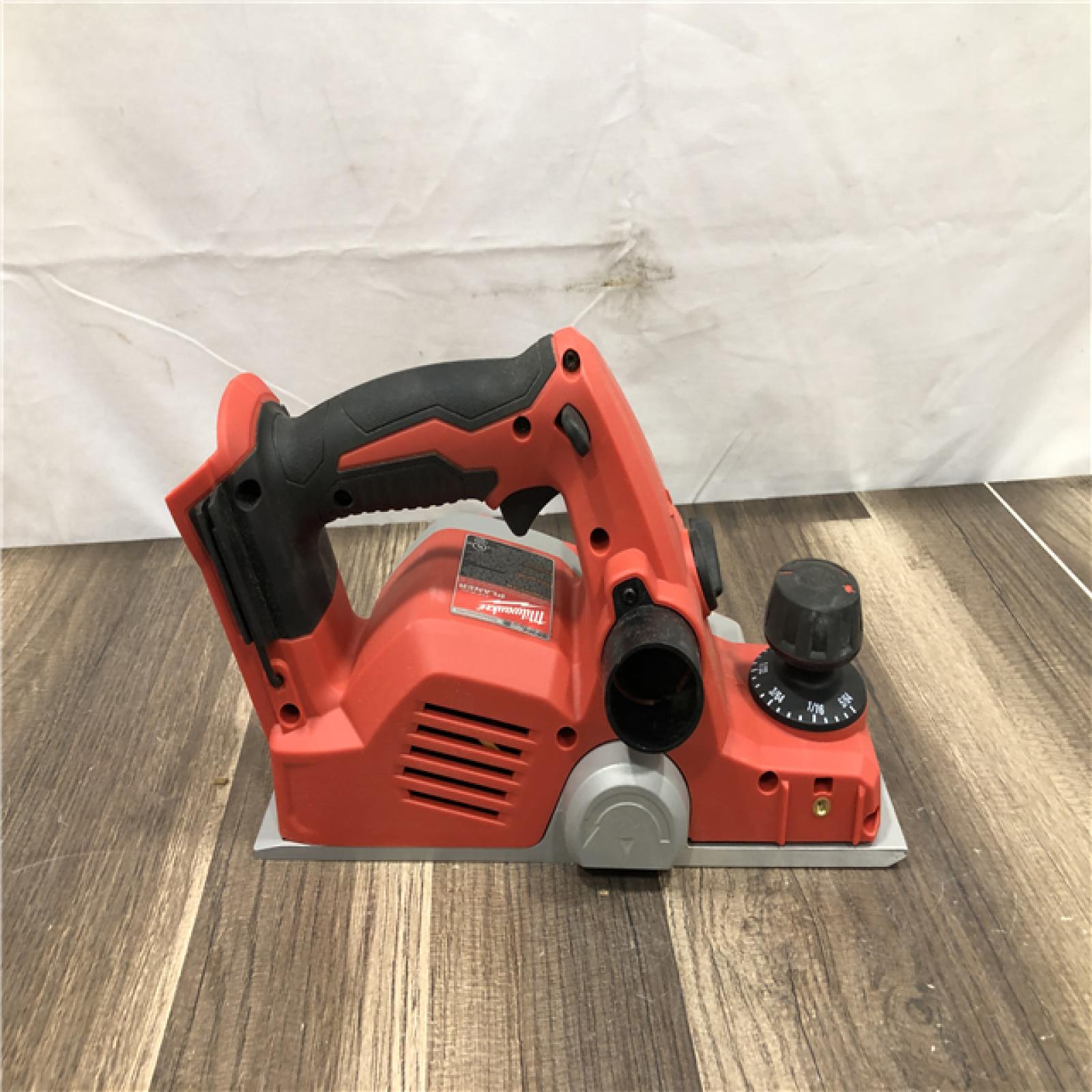 AS-IS Milwaukee M18 18V Lithium-Ion Cordless 3-1/4 in. Planer (Tool-Only)