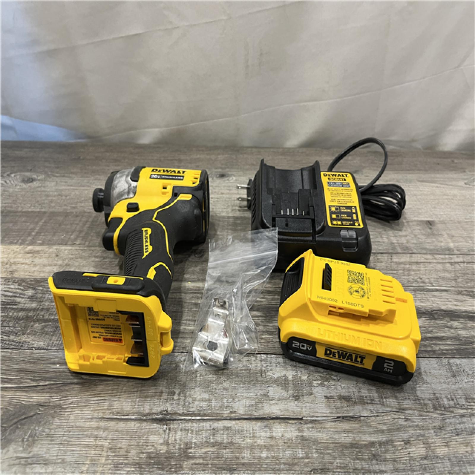 AS-IS DEWALT Atomic 20V Max Lithium-Ion Brushless Cordless Compact 1/4 in. Impact Driver Kit