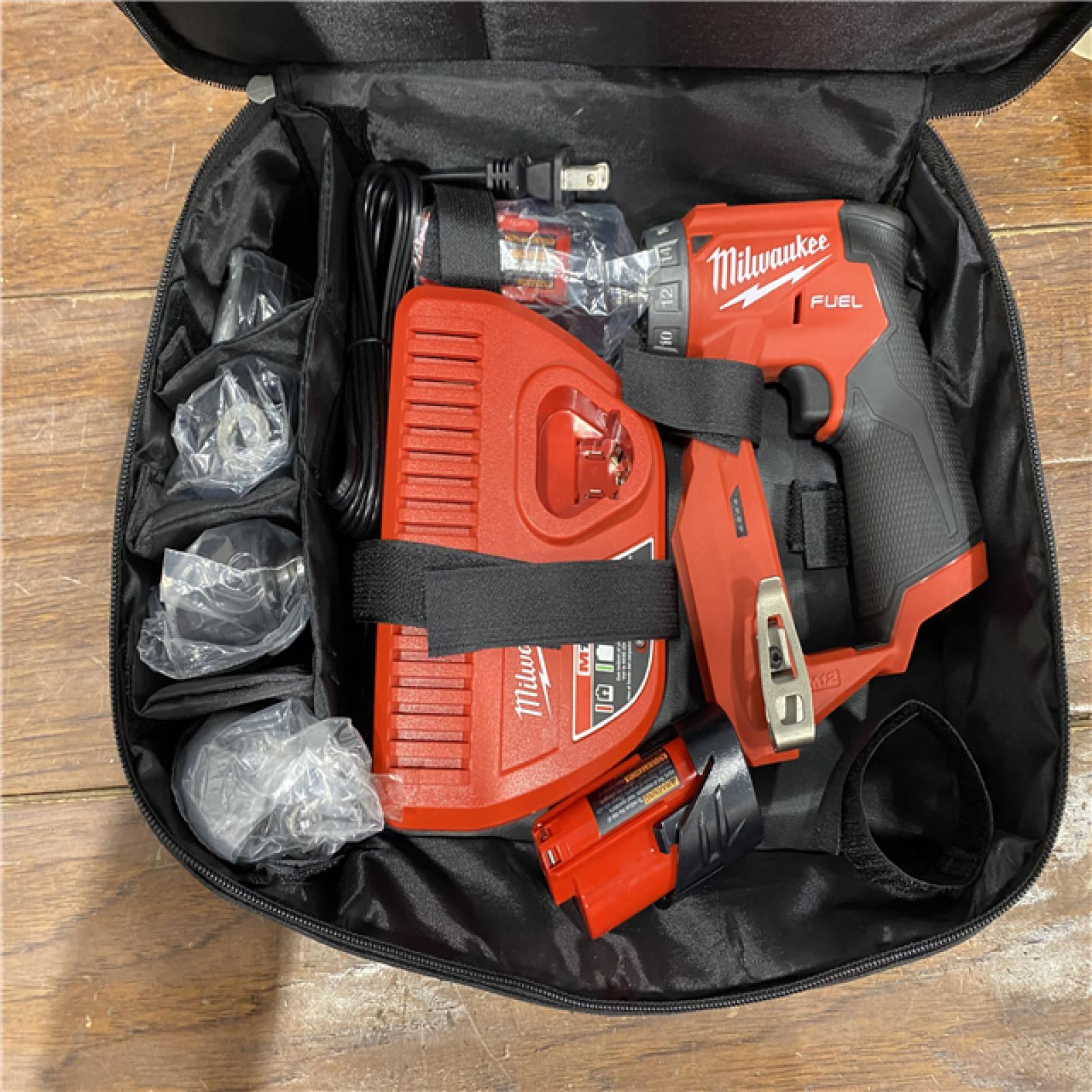 AS-IS Milwaukee M12 FUEL 12V Lithium-Ion Brushless Cordless 4-in-1 Installation 3/8 in. Drill Driver Kit with 4-Tool Heads