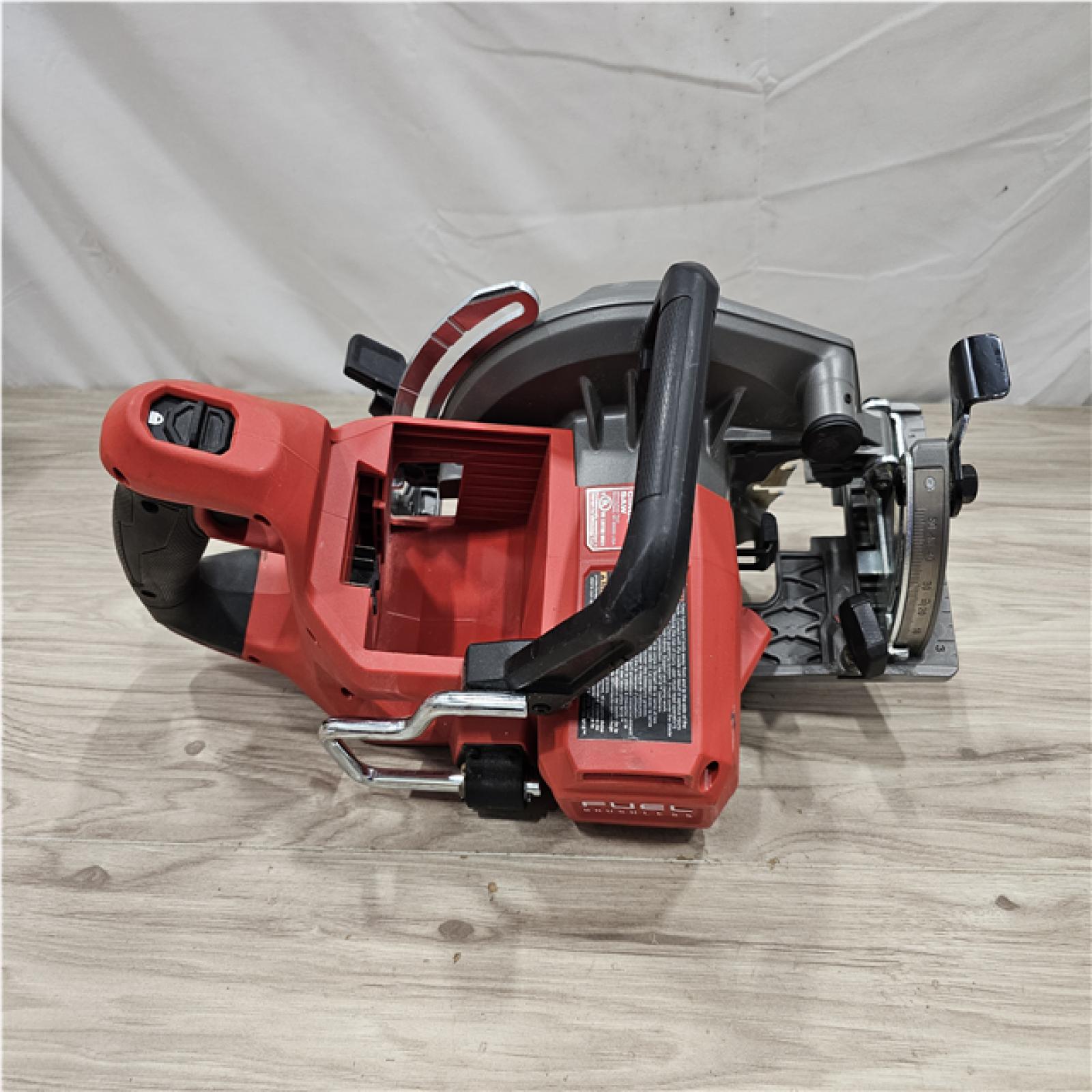 AS-IS Milwaukee FUEL 18V Lithium-Ion Cordless 7-1/4 in. Rear Handle Circular Saw (Tool-Only)