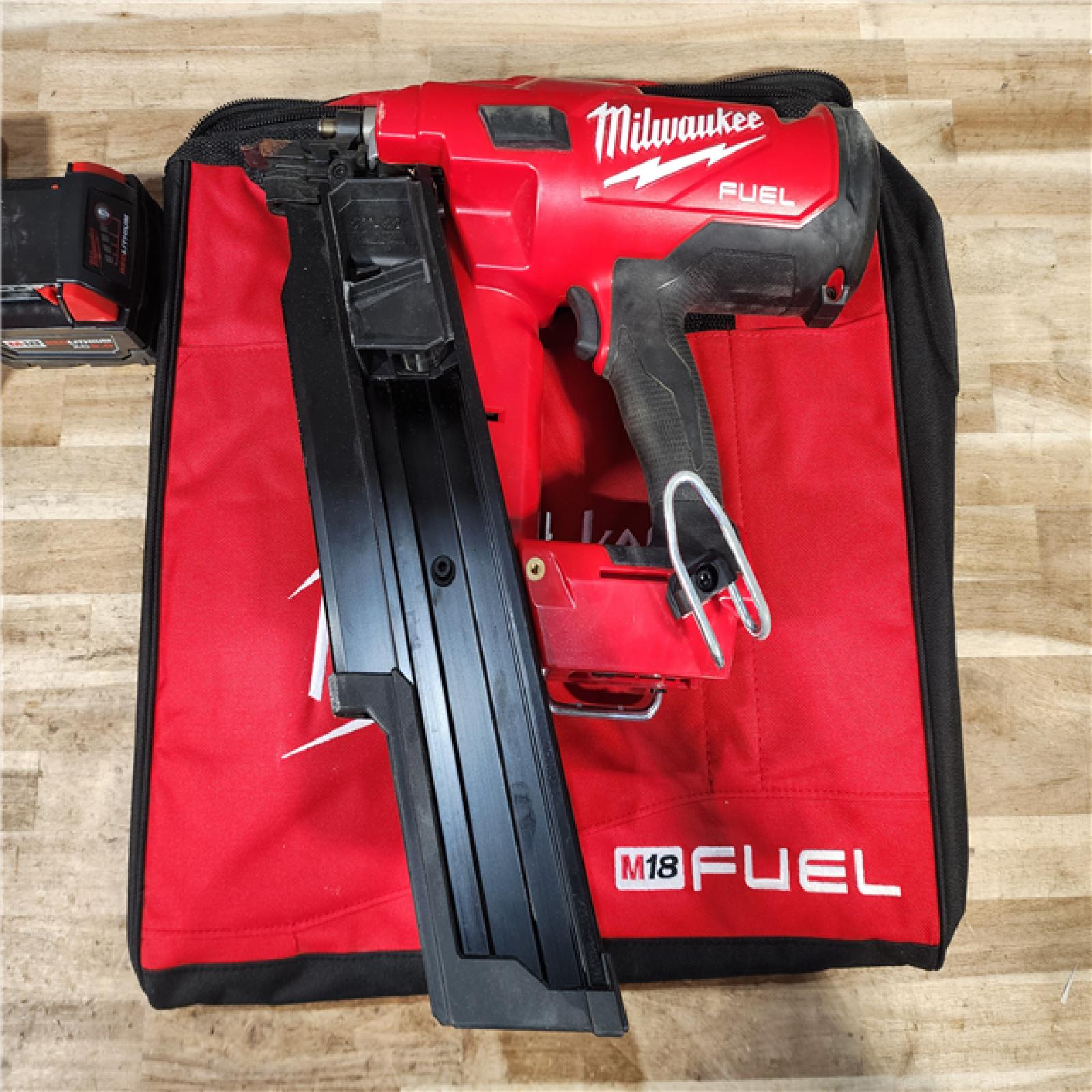 HOUSTON LOCATION - AS-IS Milwaukee M18 FUEL 3-1/2 in. 18-Volt 21° Lithium-Ion Brushless Cordless Framing Nailer Kit with 5.0 Ah Battery  Charger  Bag