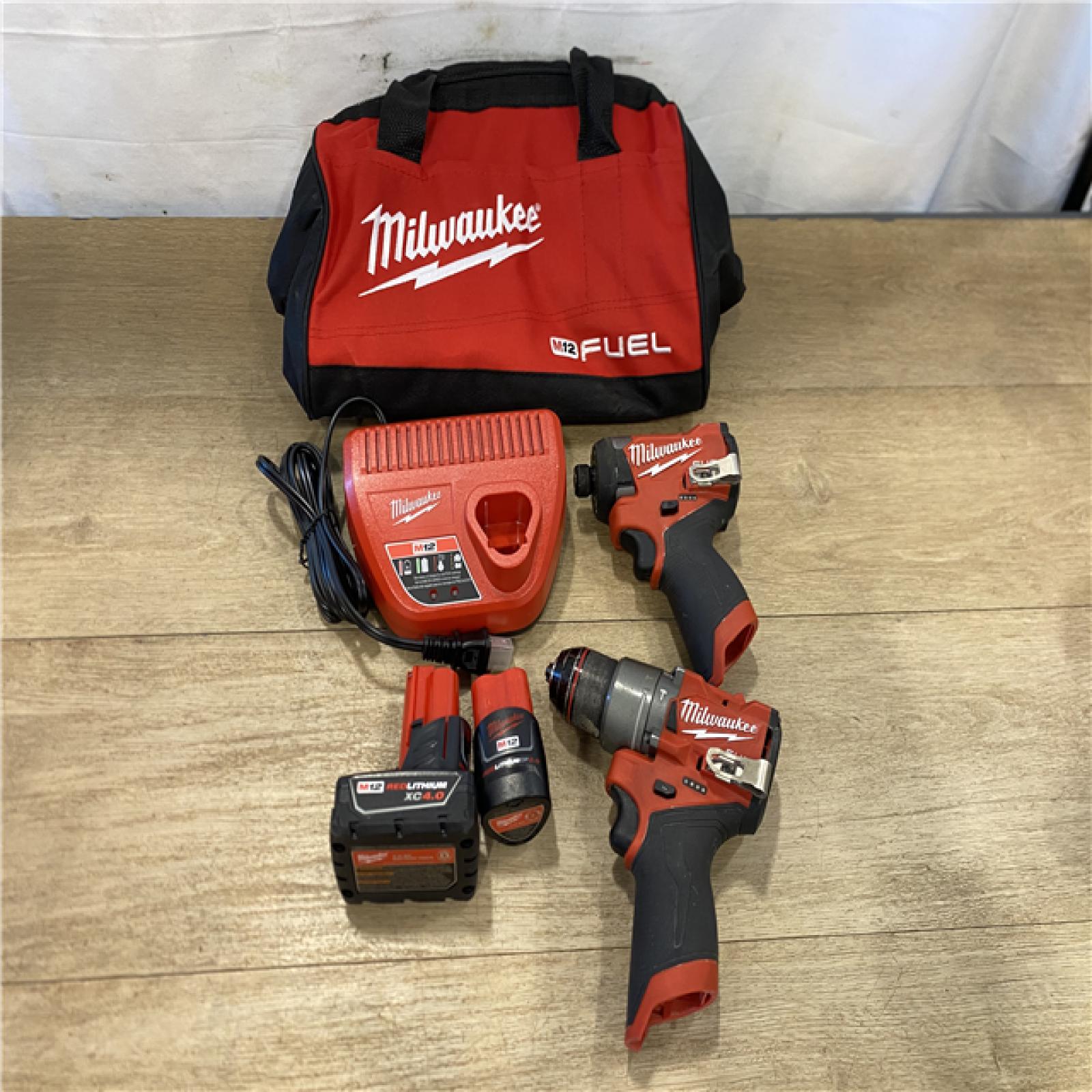 AS-IS Milwaukee FUEL 12-Volt Lithium-Ion Brushless Cordless Hammer Drill and Impact Driver Combo Kit