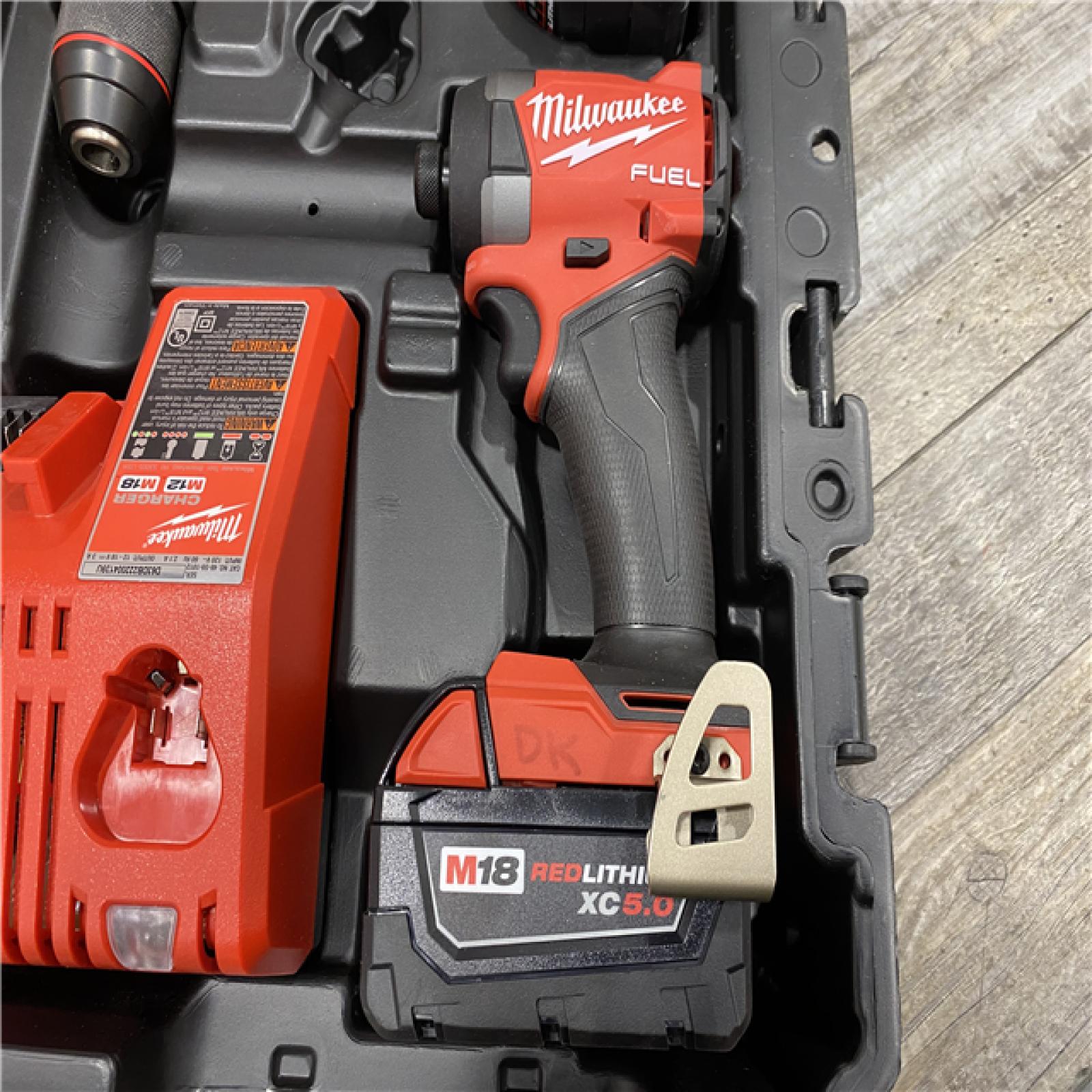 AS-IS Milwaukee FUEL 18V Lithium-Ion Brushless Cordless Hammer Drill and Impact Driver Combo Kit