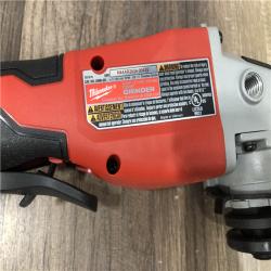 AS-IS Milwaukee 18V Lithium-Ion Brushless Cordless 4-1/2 in./5 in. Grinder w/Paddle Switch (Tool-Only)