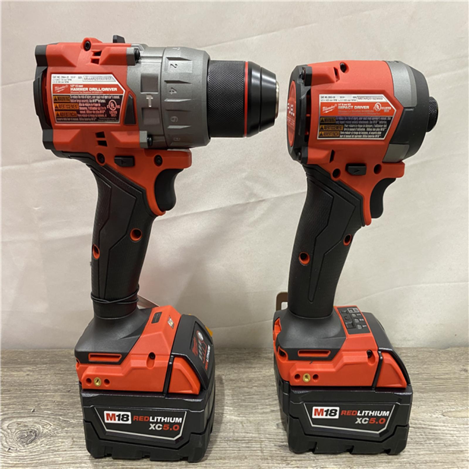 AS-IS Milwaukee FUEL 18V Lithium-Ion Brushless Cordless Hammer Drill and Impact Driver Combo Kit