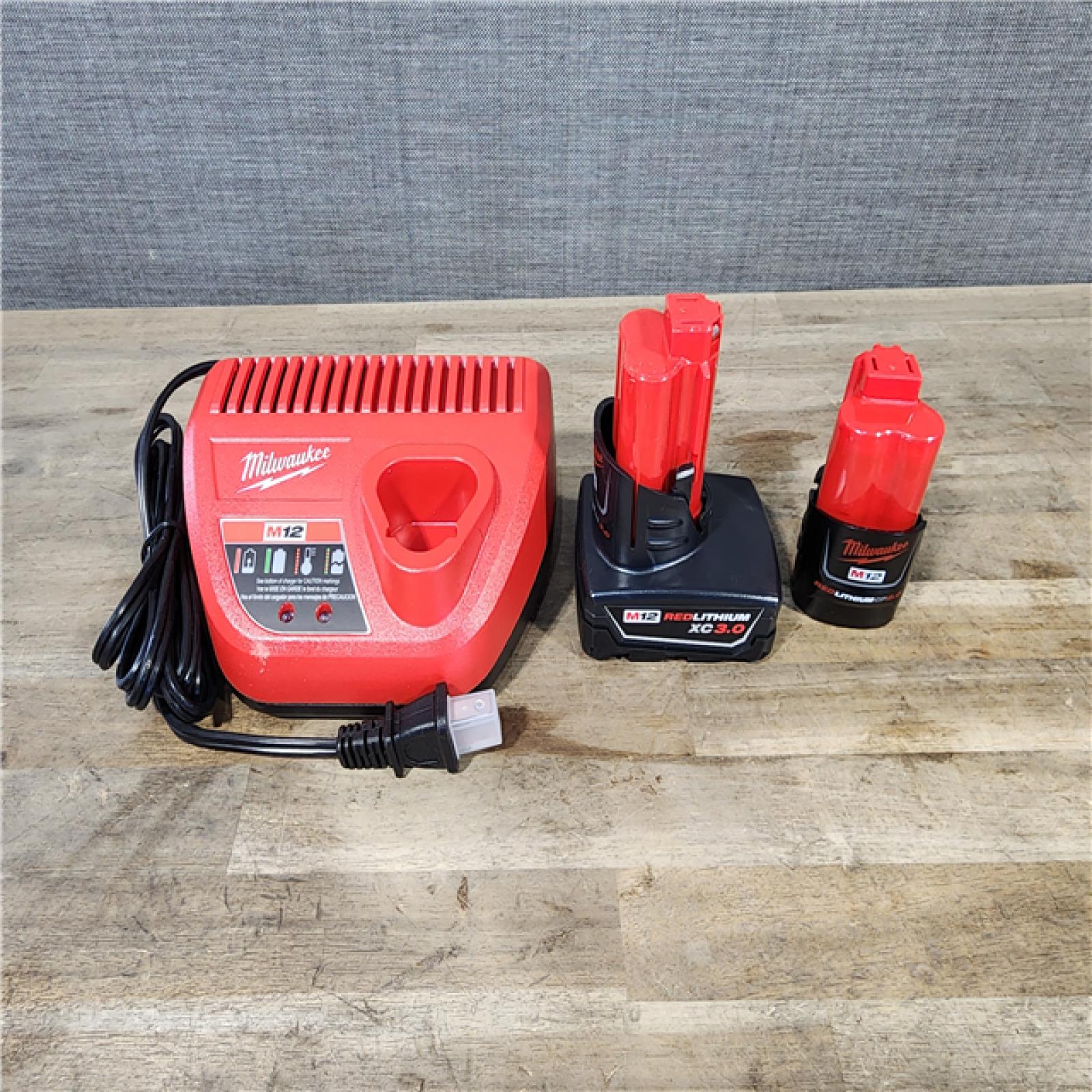 HOUSTON LOCATION - AS-IS Milwaukee 3497-22 12V Brushless Hammer Drill and Impact Driver Combo Kit