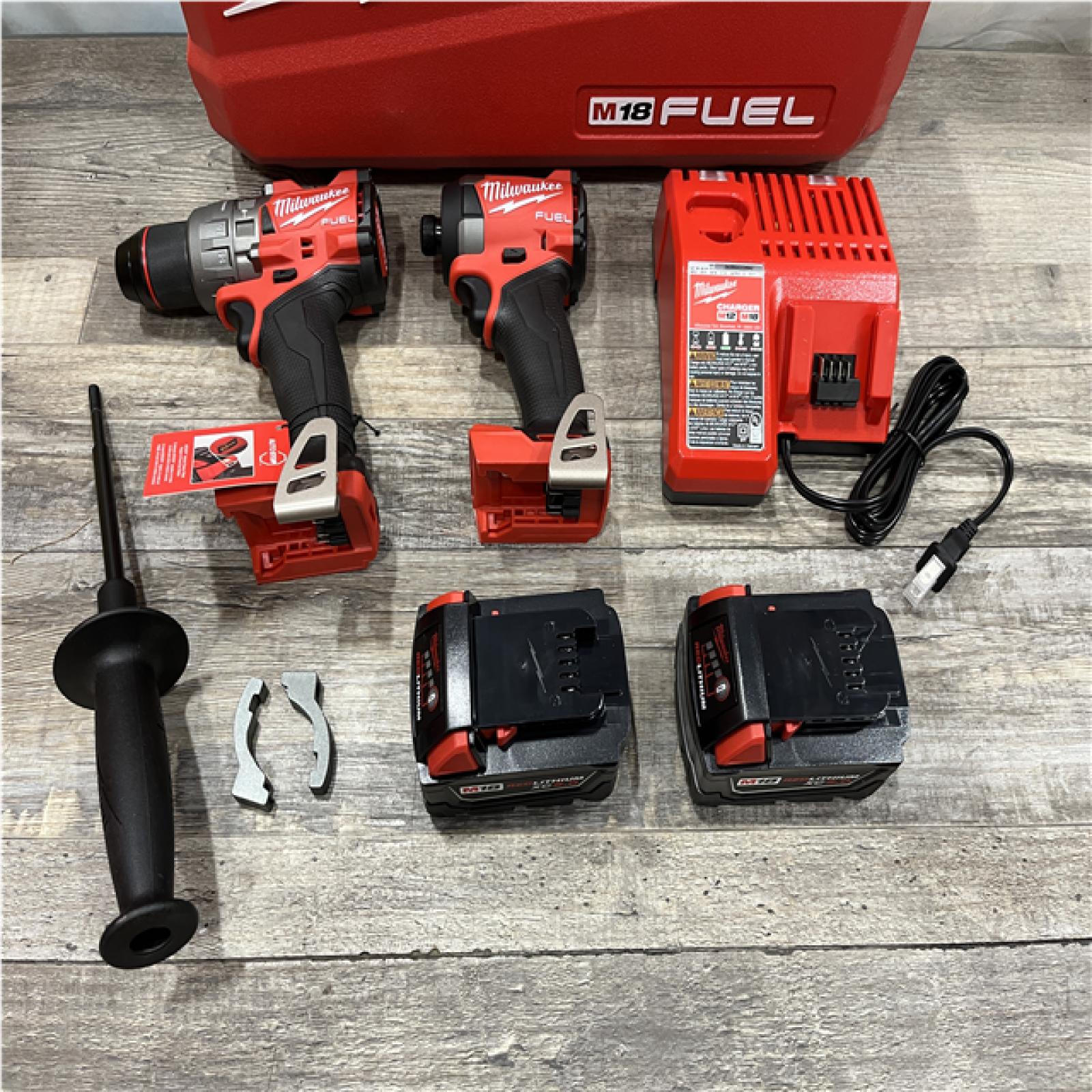 AS-IS Milwaukee FUEL 18V Lithium-Ion Brushless Cordless Hammer Drill and Impact Driver Combo Kit