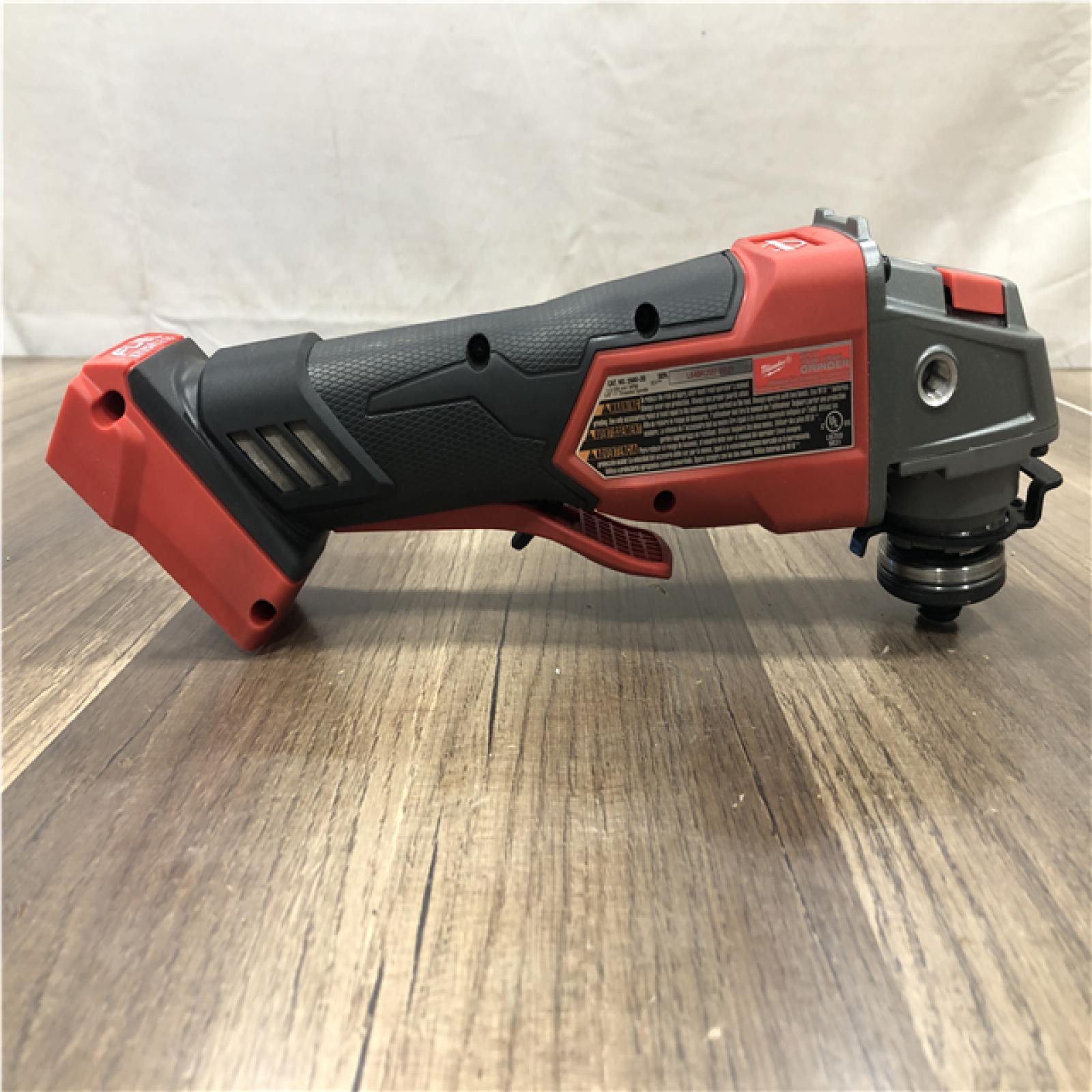 AS-IS Milwaukee FUEL 18V Lithium-Ion Brushless Cordless 4-1/2 in./5 in. Grinder w/Paddle Switch (Tool-Only)