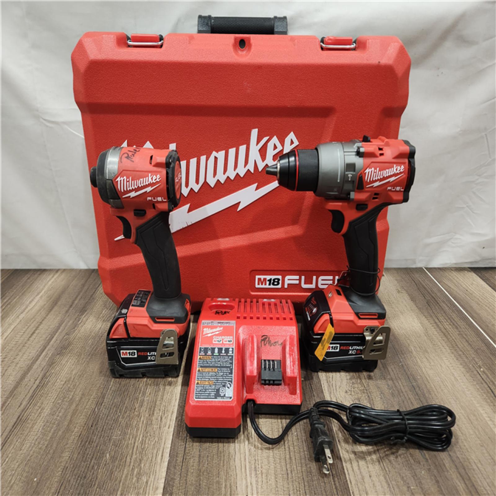 AS-IS- MILWAUKEE FUEL 18V Lithium-Ion Brushless Cordless Hammer Drill and Impact Driver Combo Kit