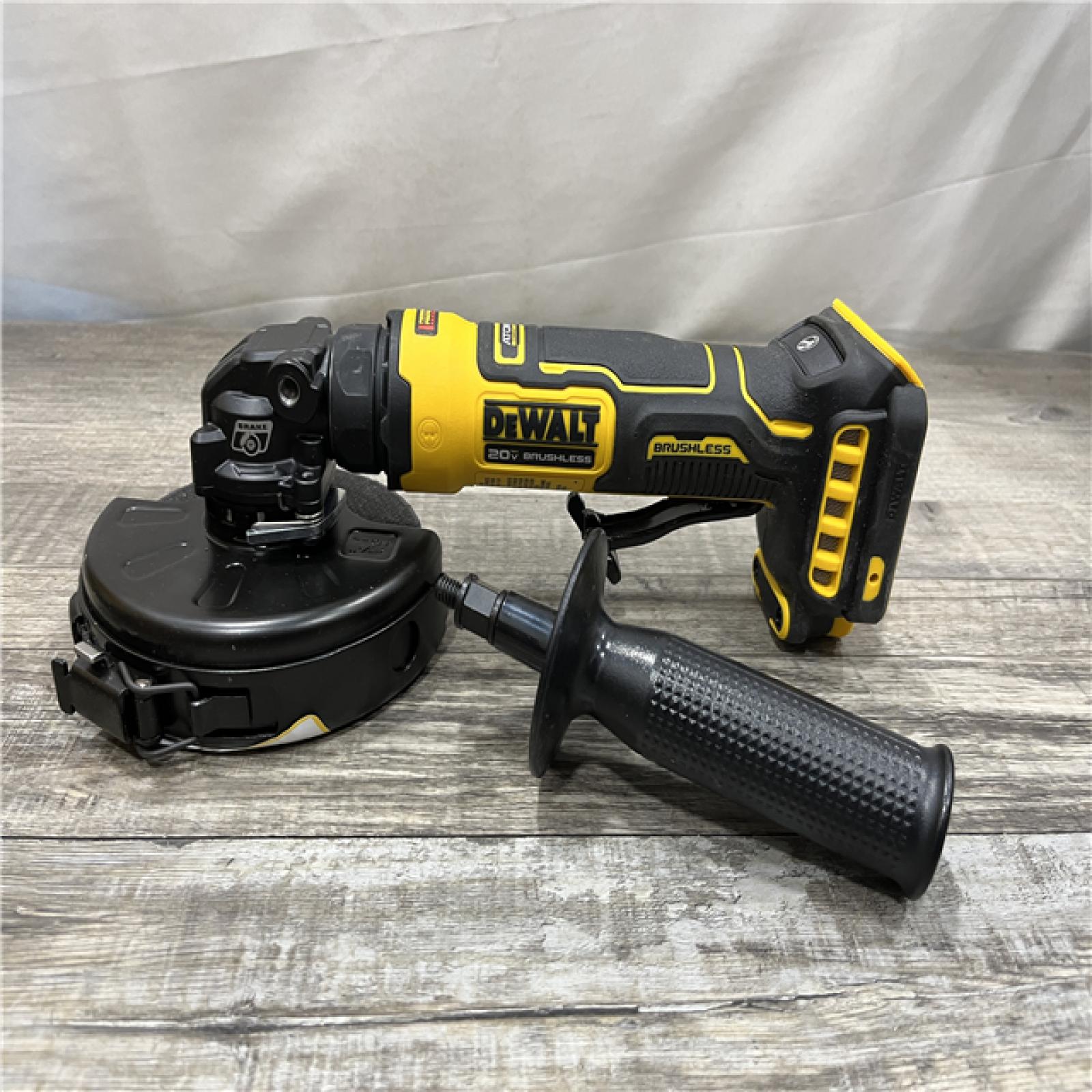 AS-IS DEWALT ATOMIC 20V MAX Cordless 4-1/2 in. Angle Grinder with Paddle Switch (Tool Only)