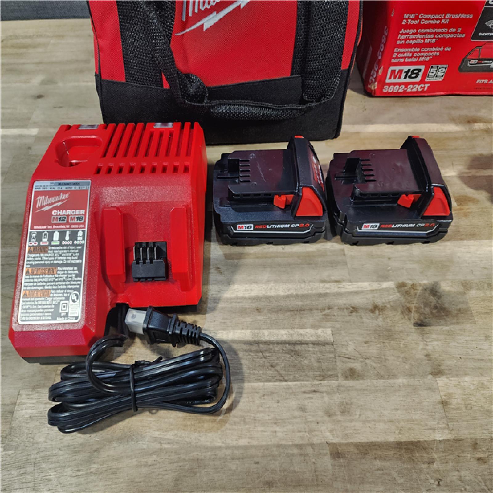 HOUSTON LOCATION - AS-IS M18 18V Lithium-Ion Brushless Cordless Compact Drill/Impact Combo Kit (2-Tool) W/(2) 2.0 Ah Batteries, Charger & Bag