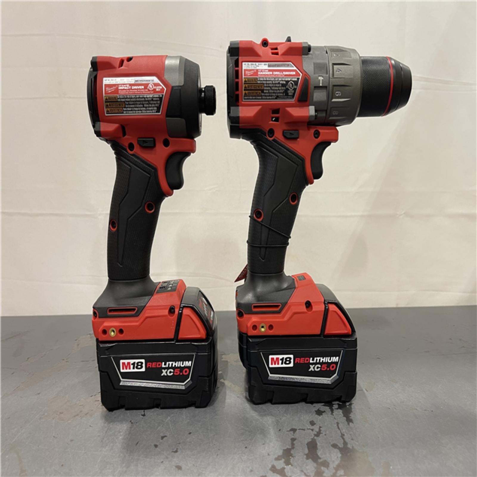 AS-IS - MILWAUKEE FUEL 18V Lithium-Ion Brushless Cordless Hammer Drill and Impact Driver Combo Kit