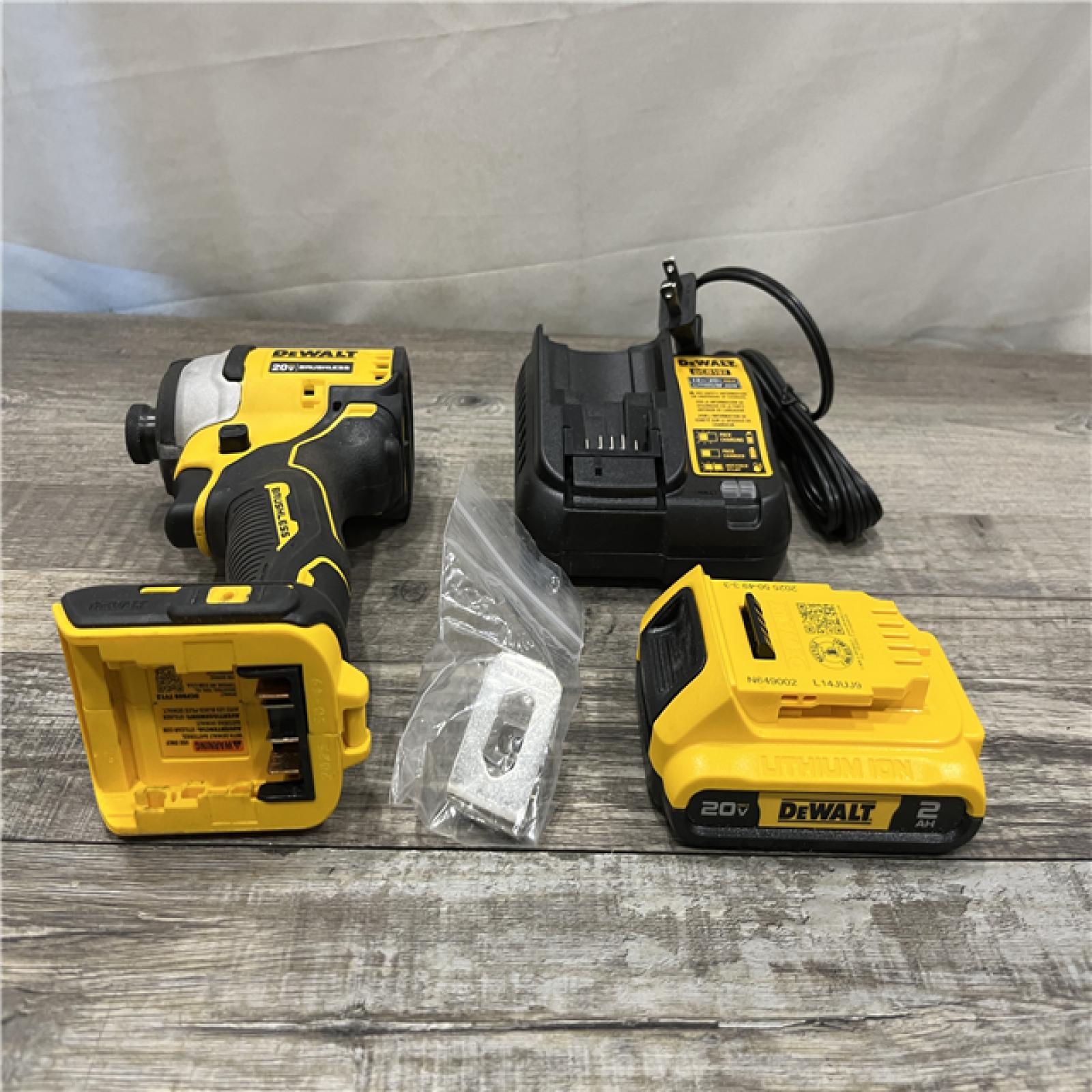 AS-IS DEWALT Atomic 20V Max Lithium-Ion Brushless Cordless Compact 1/4 in. Impact Driver Kit