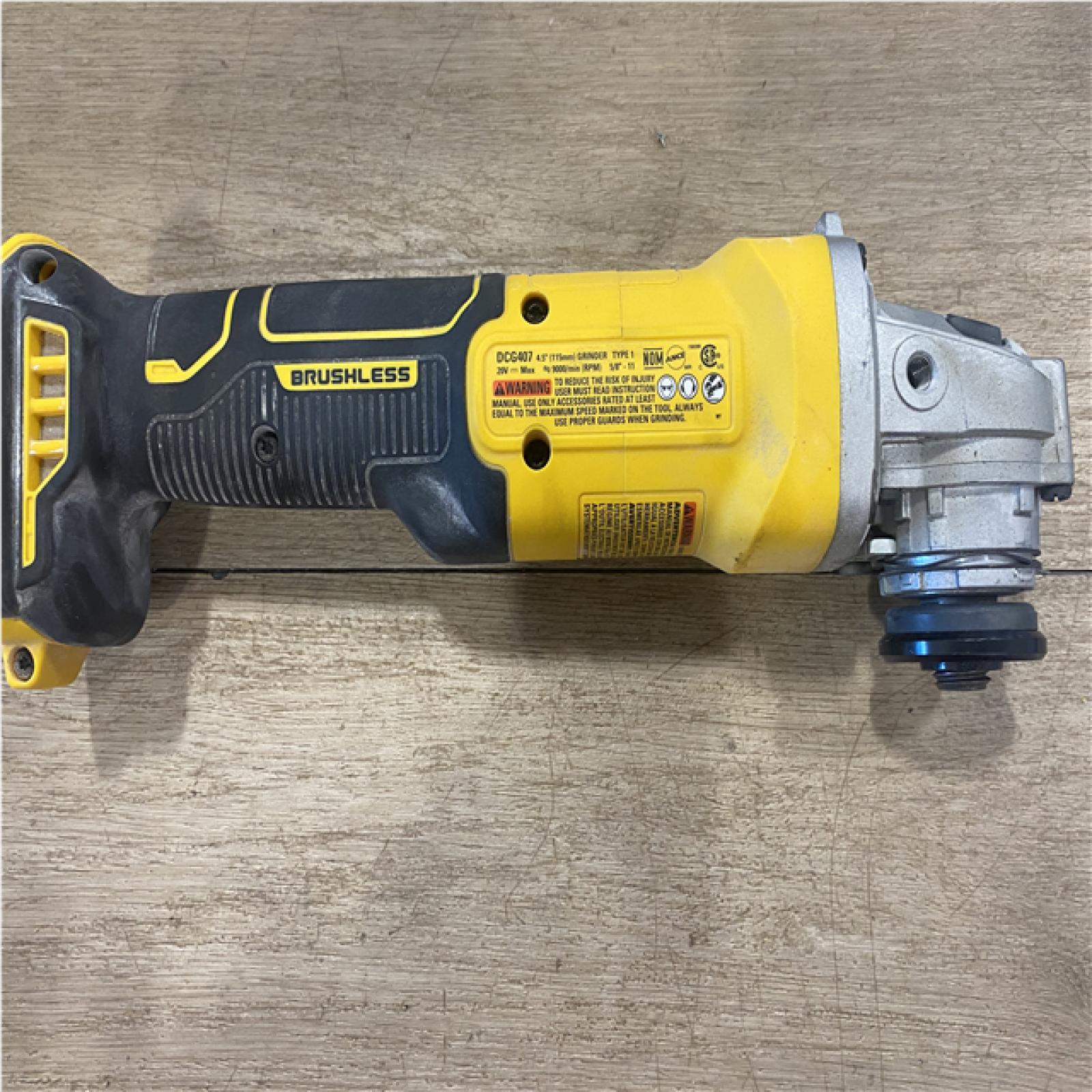 AS-IS DEWALT 20-Volt MAX Cordless Brushless 4-1/2 in. Angle Grinder with Slide Switch (Tool Only)