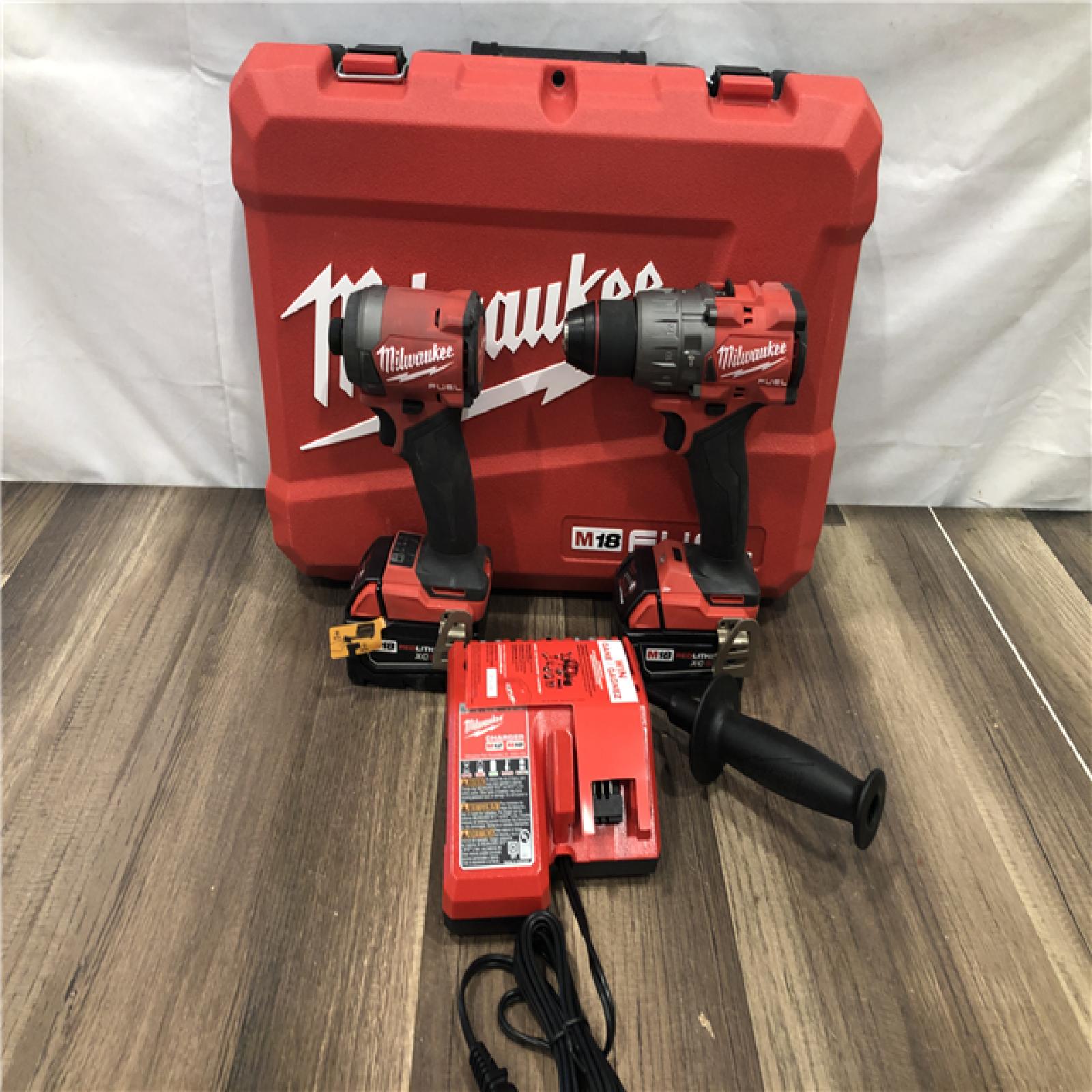 AS-IS Milwaukee FUEL 18V Lithium-Ion Brushless Cordless Hammer Drill and Impact Driver Combo Kit