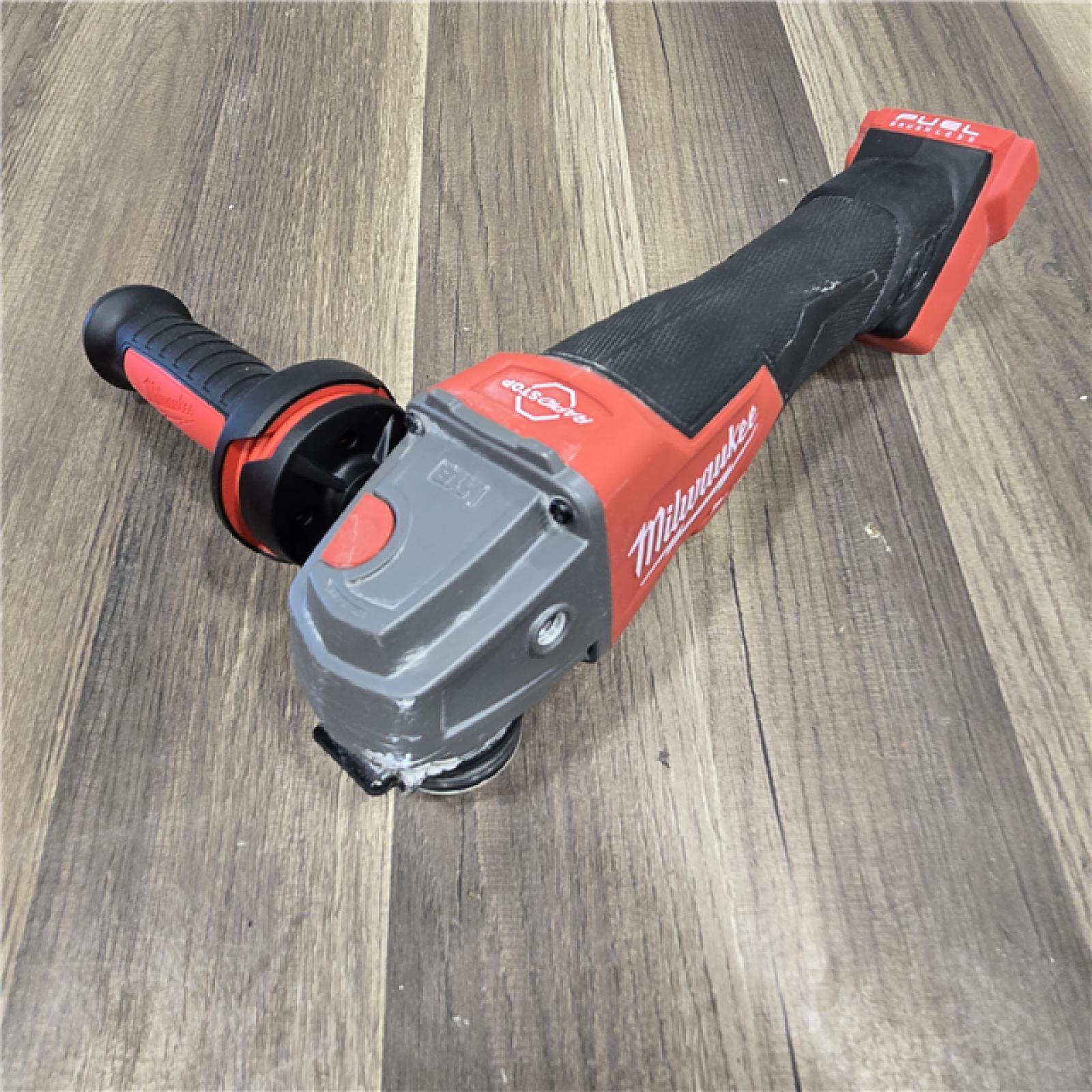 AS-IS Milwaukee 2880-20 FUEL 18-Volt Lithium-Ion Brushless Cordless 4-1/2 in./5 in. Grinder W/Paddle Switch (Tool-Only)