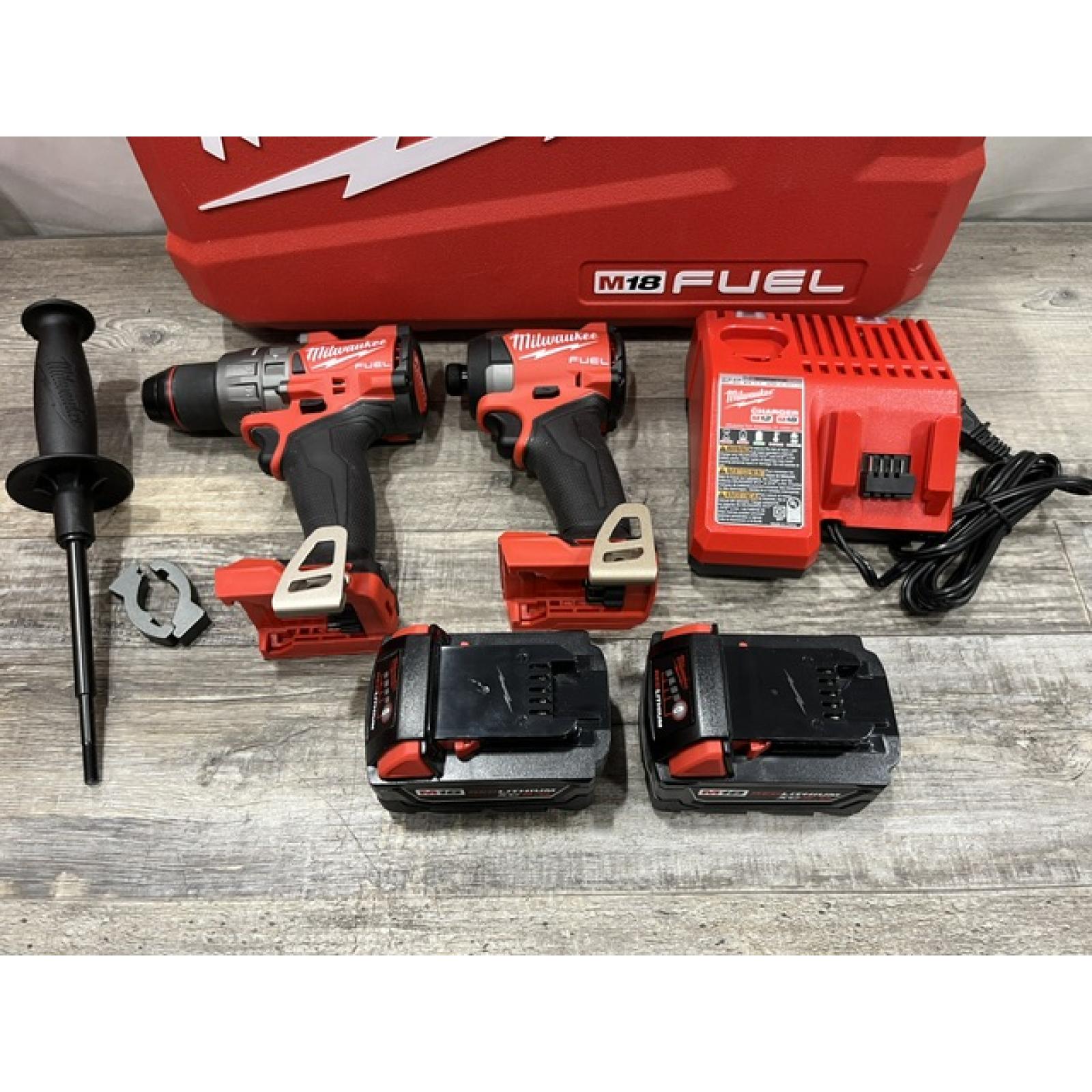 AS-IS Milwaukee FUEL 18V Lithium-Ion Brushless Cordless Hammer Drill and Impact Driver Combo Kit